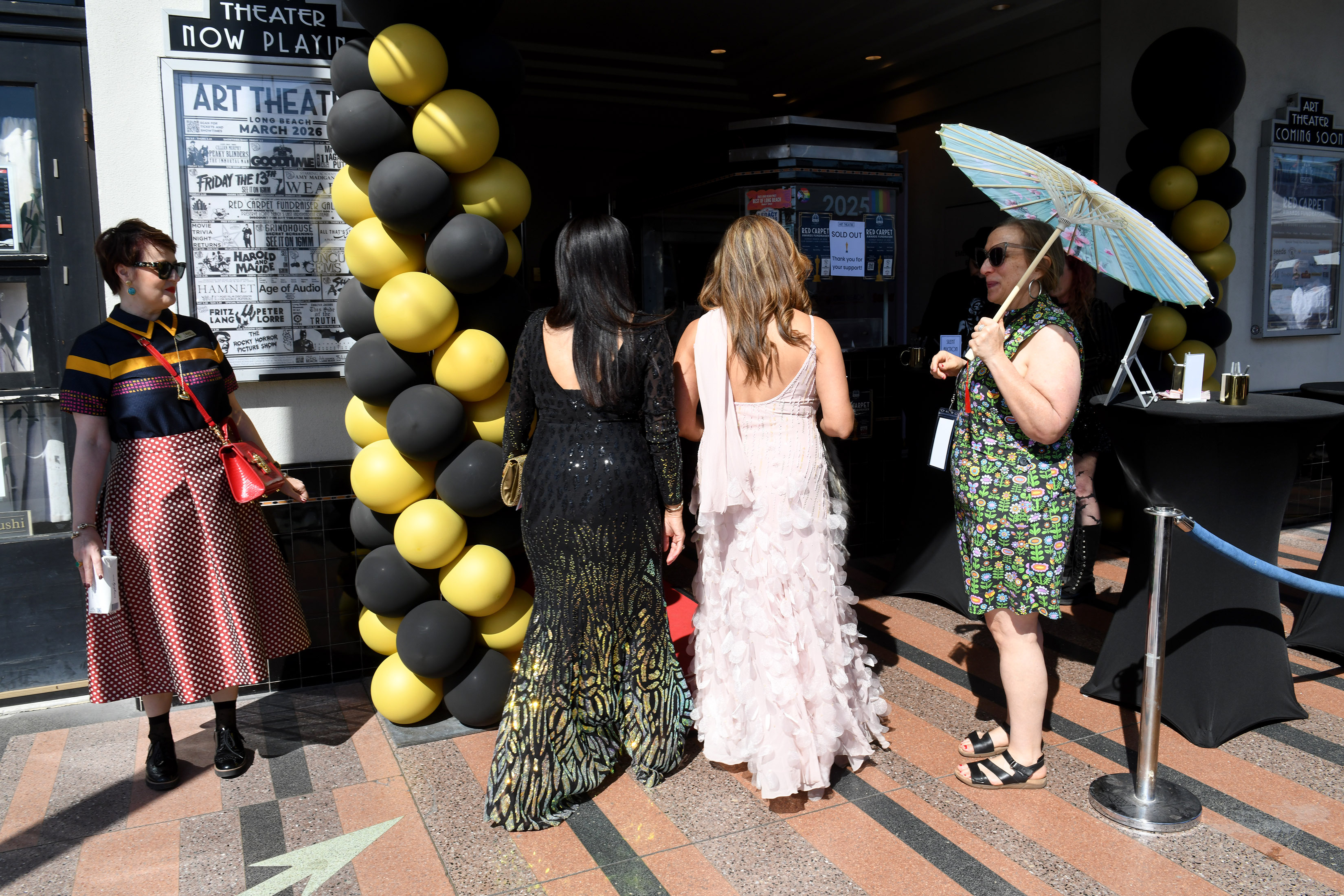 People arrive for the Long Beach Art Theatreâs annual red...