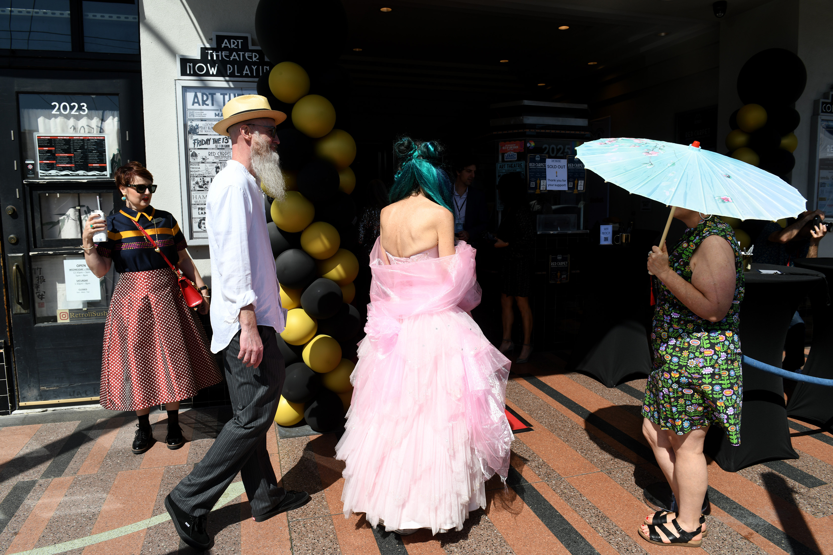 John and Kristen Corenbaum arrive for the Long Beach Art...