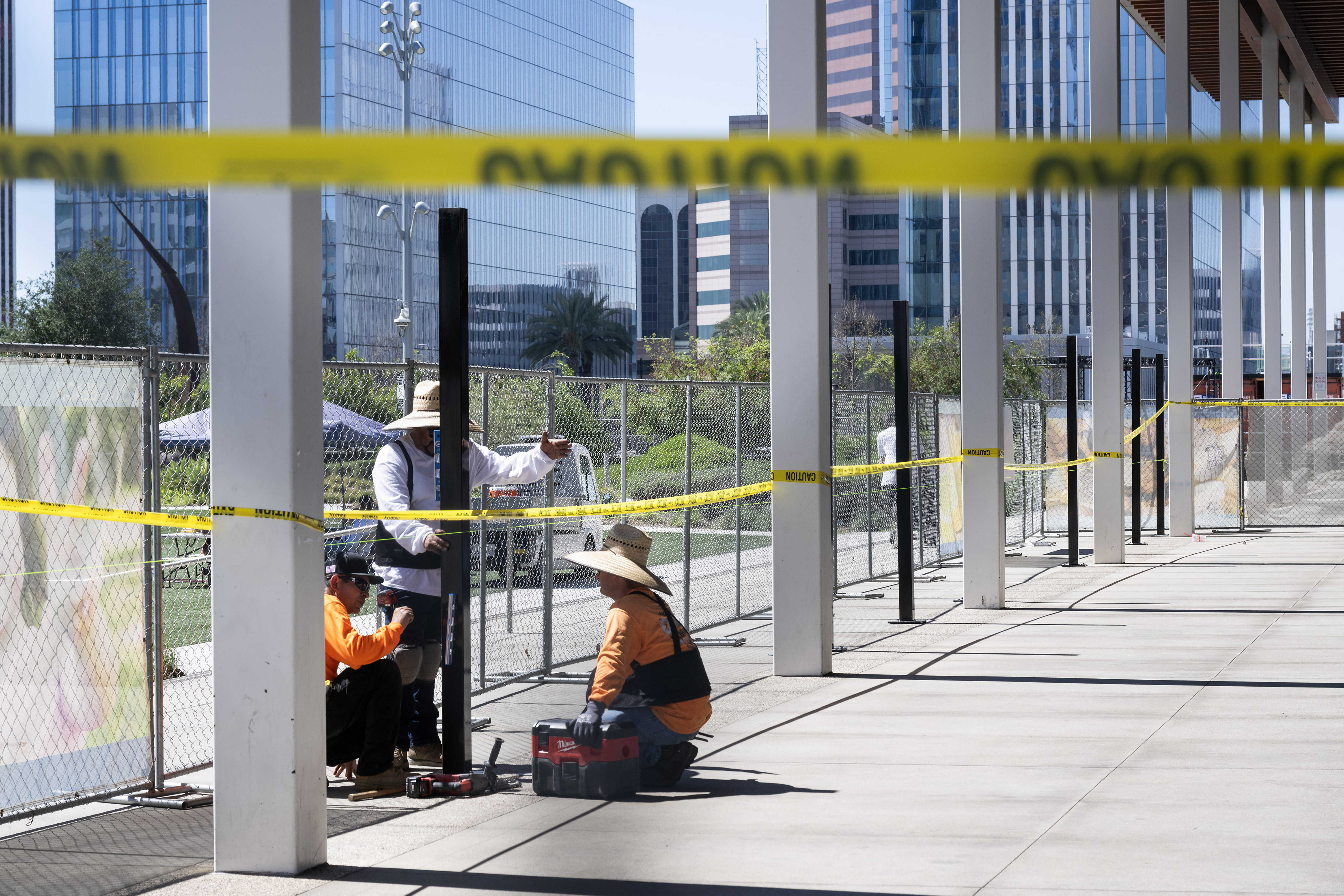 Long Beachâs Public Works Department installs a fence on the...
