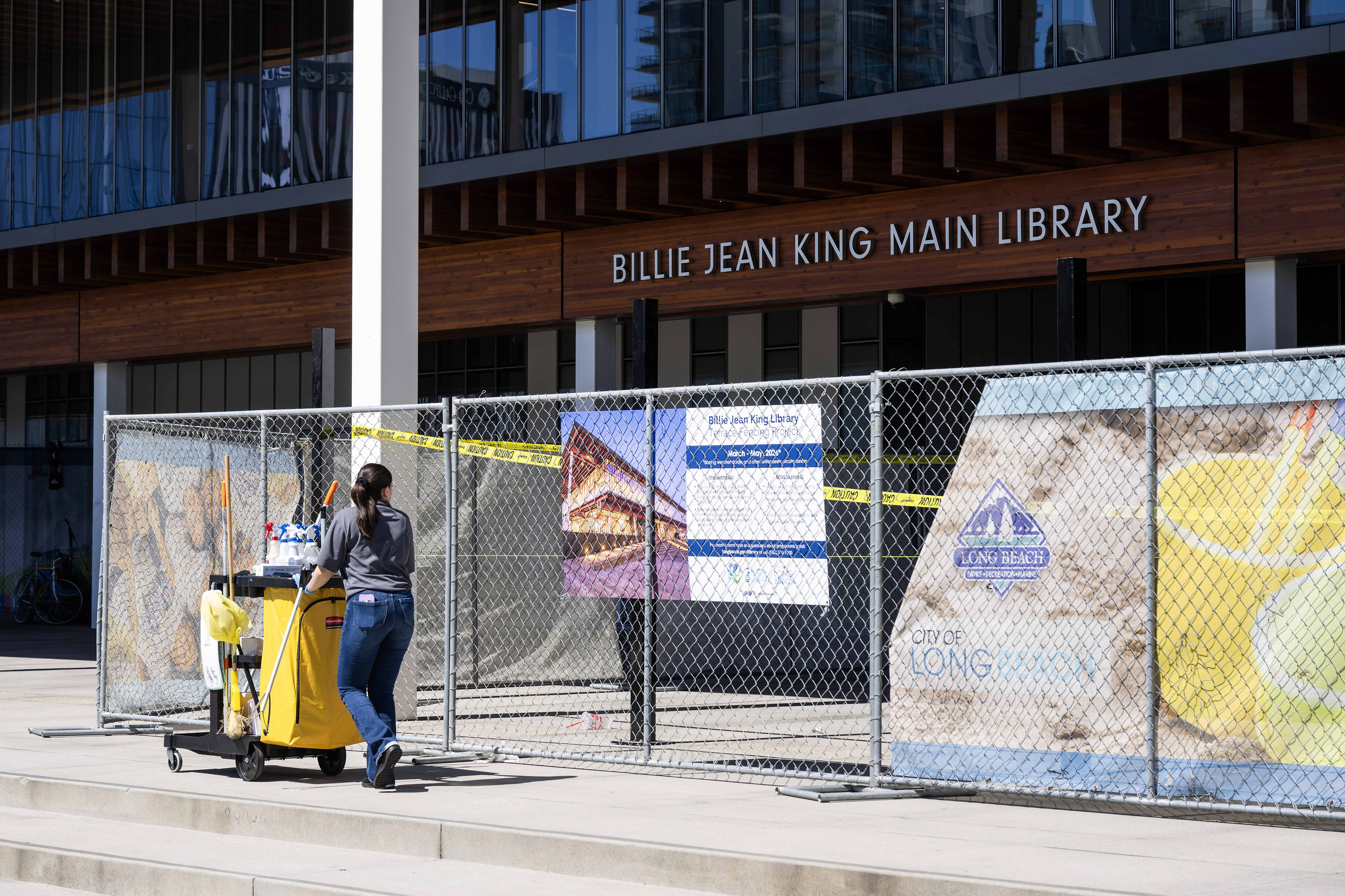 Long Beachâs Public Works Department installs a fence on the...