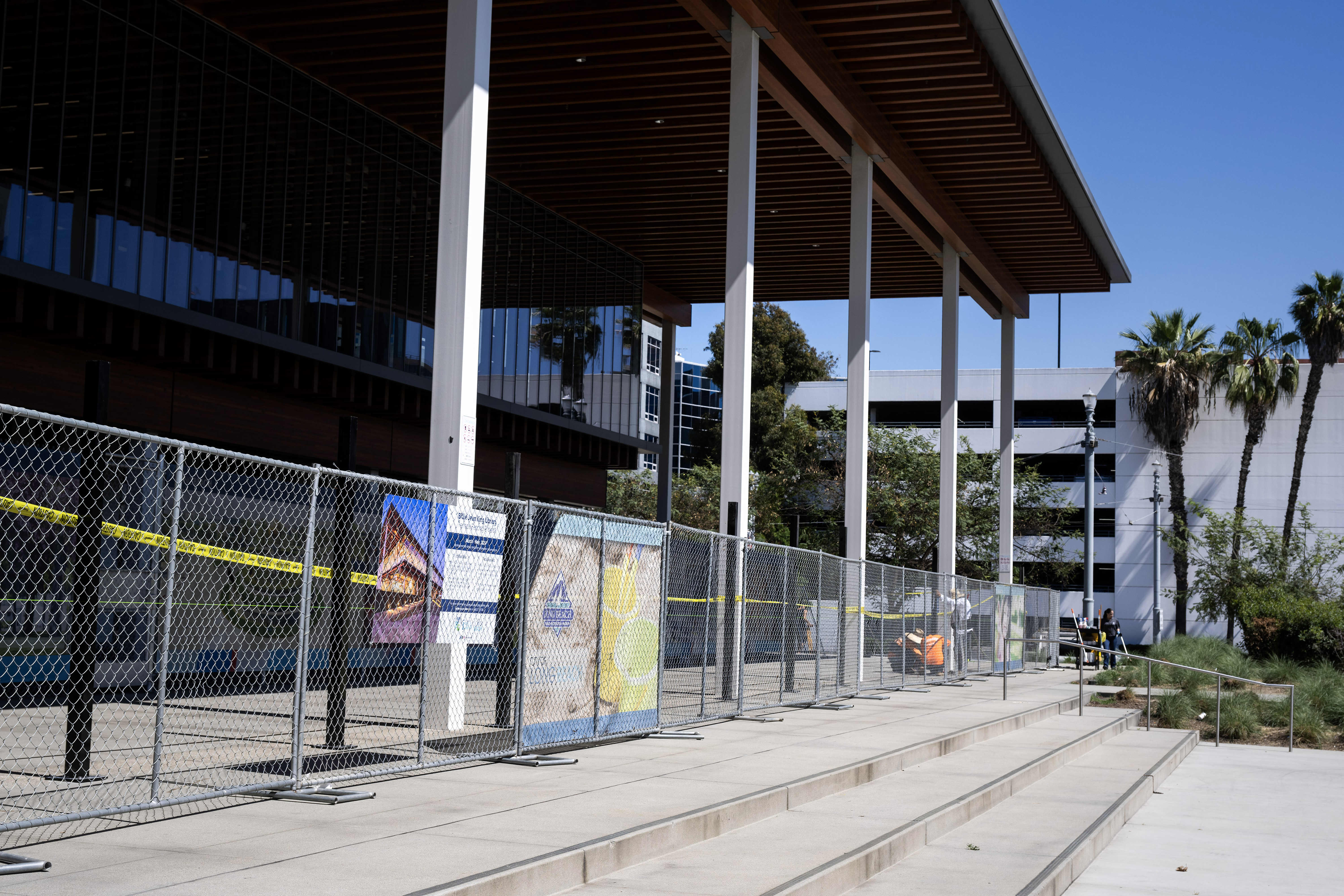 Long Beachâs Public Works Department installs a fence on the...