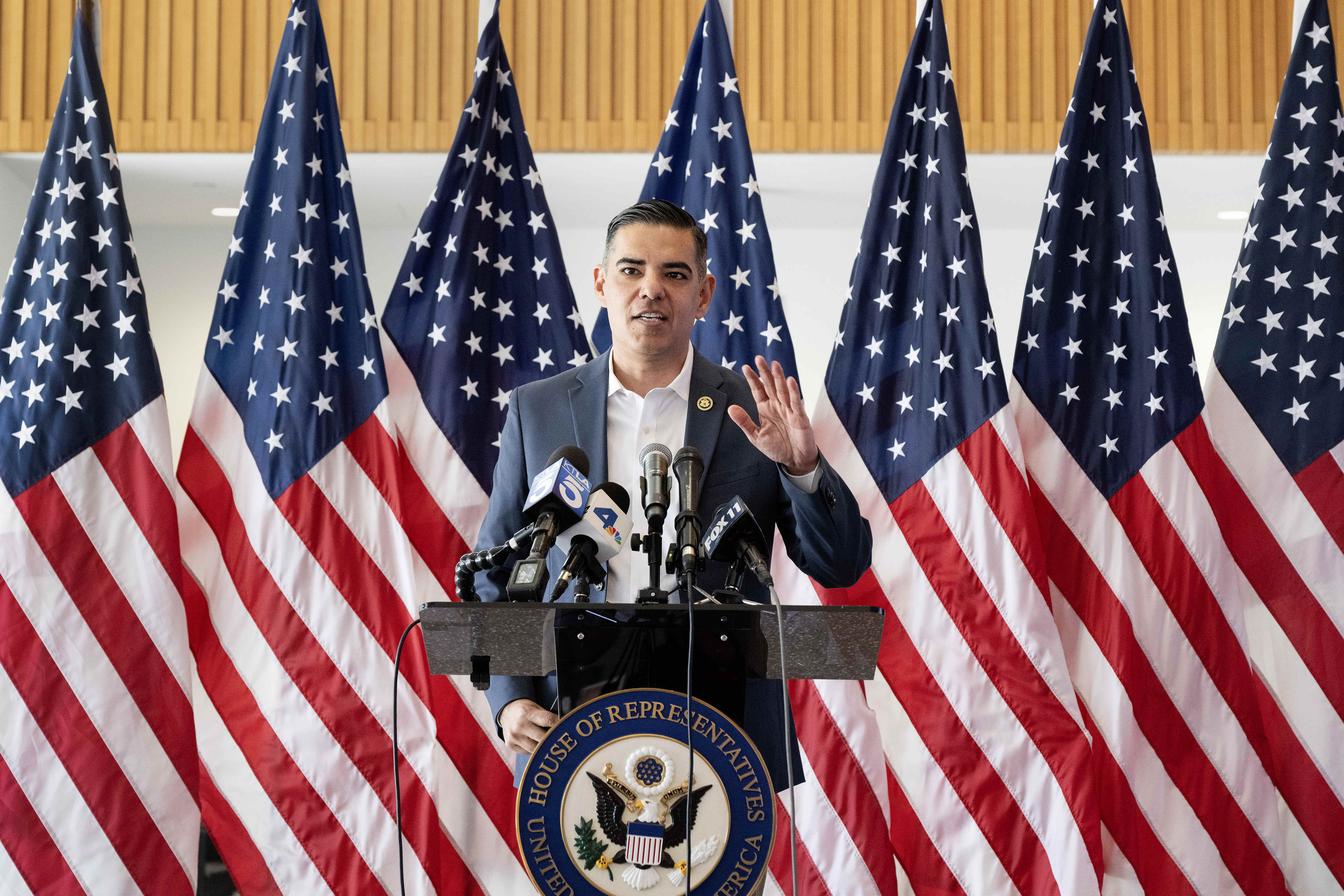 Rep. Robert Garcia speaks before presenting more than $2.9 million...