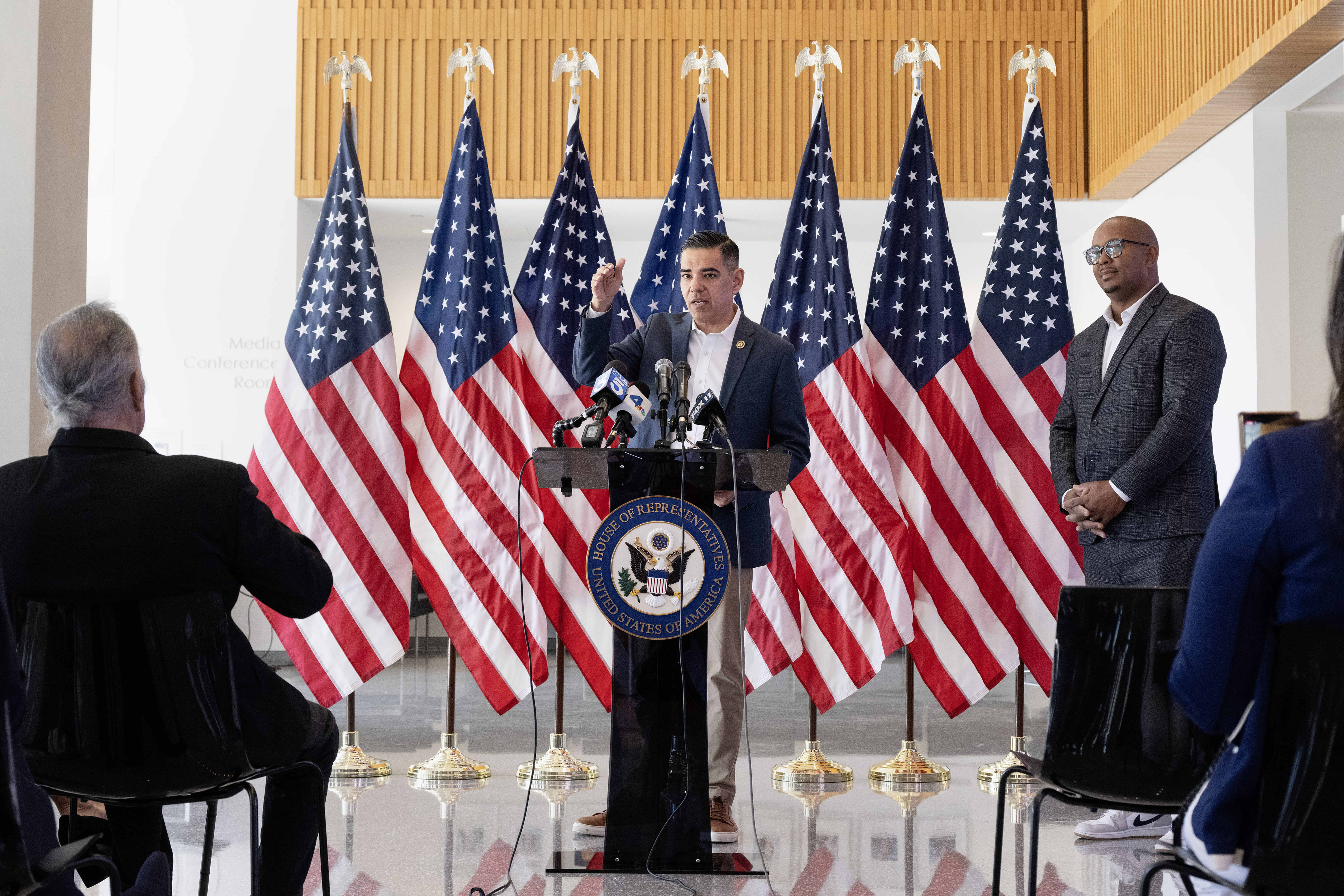 Rep. Robert Garcia speaks before presenting more than $2.9 million...