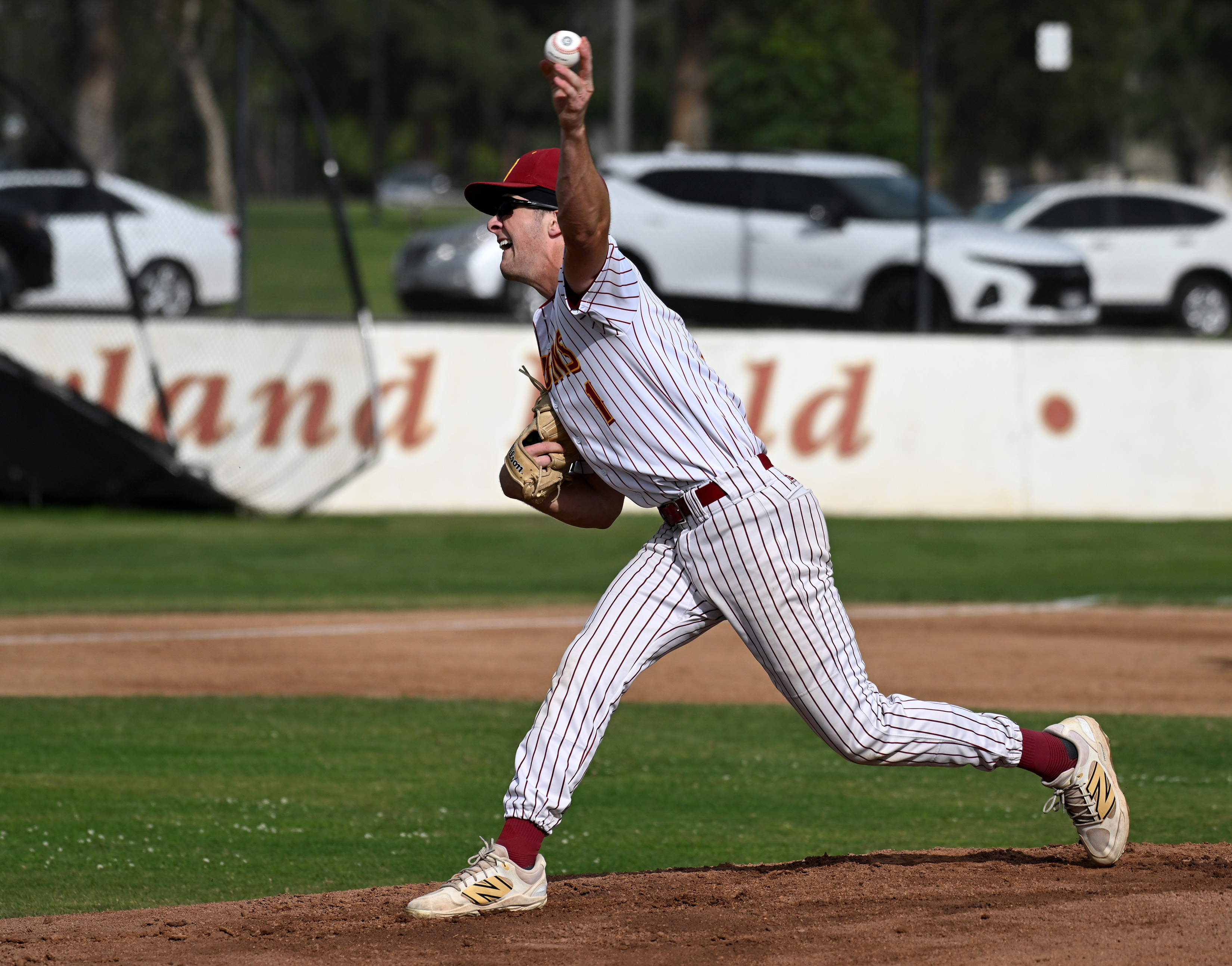 Shane Guy pitches for Wilson against Cabrilllo during opening day...