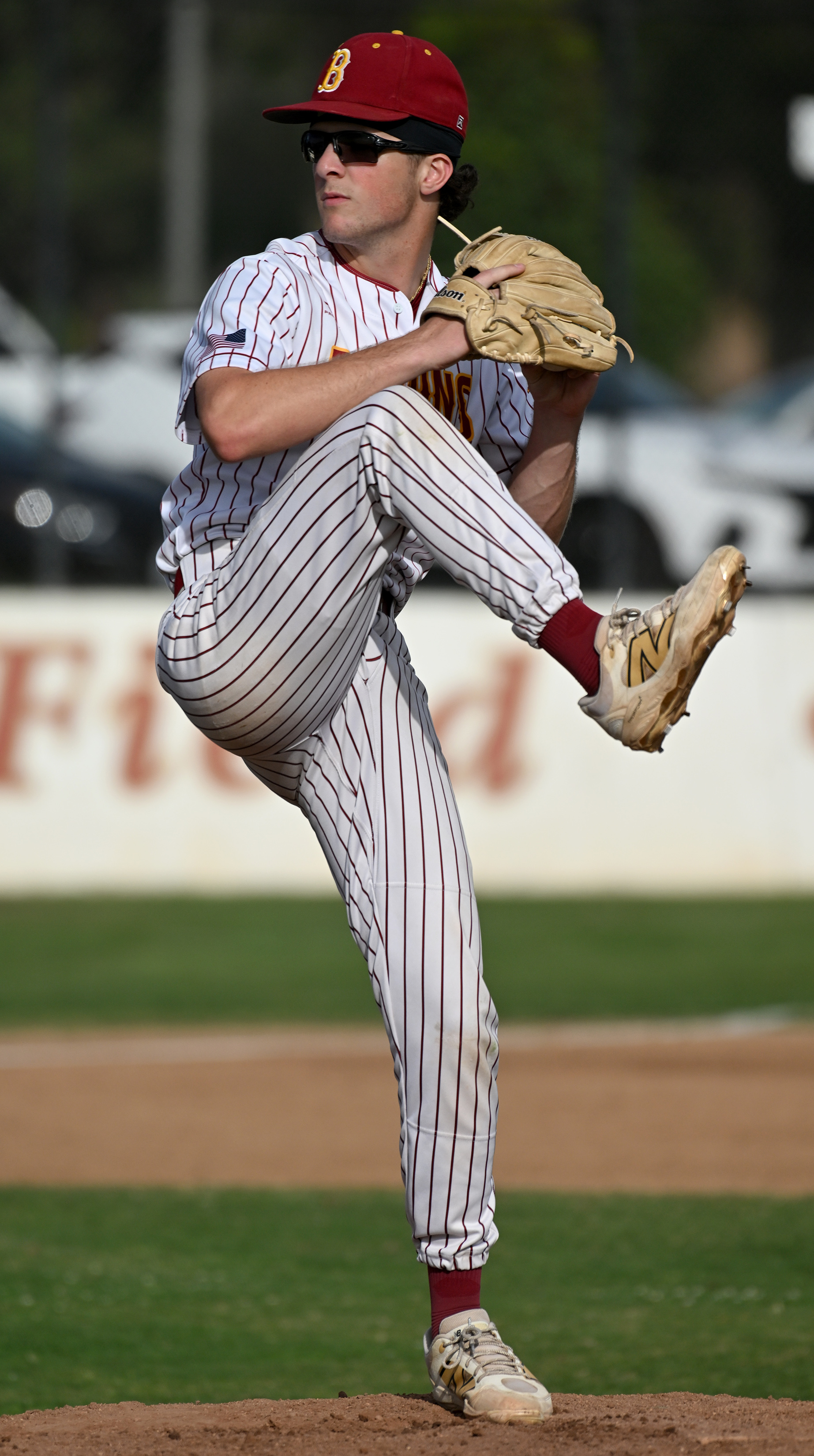 Shane Guy pitches for Wilson against Cabrilllo during opening day...
