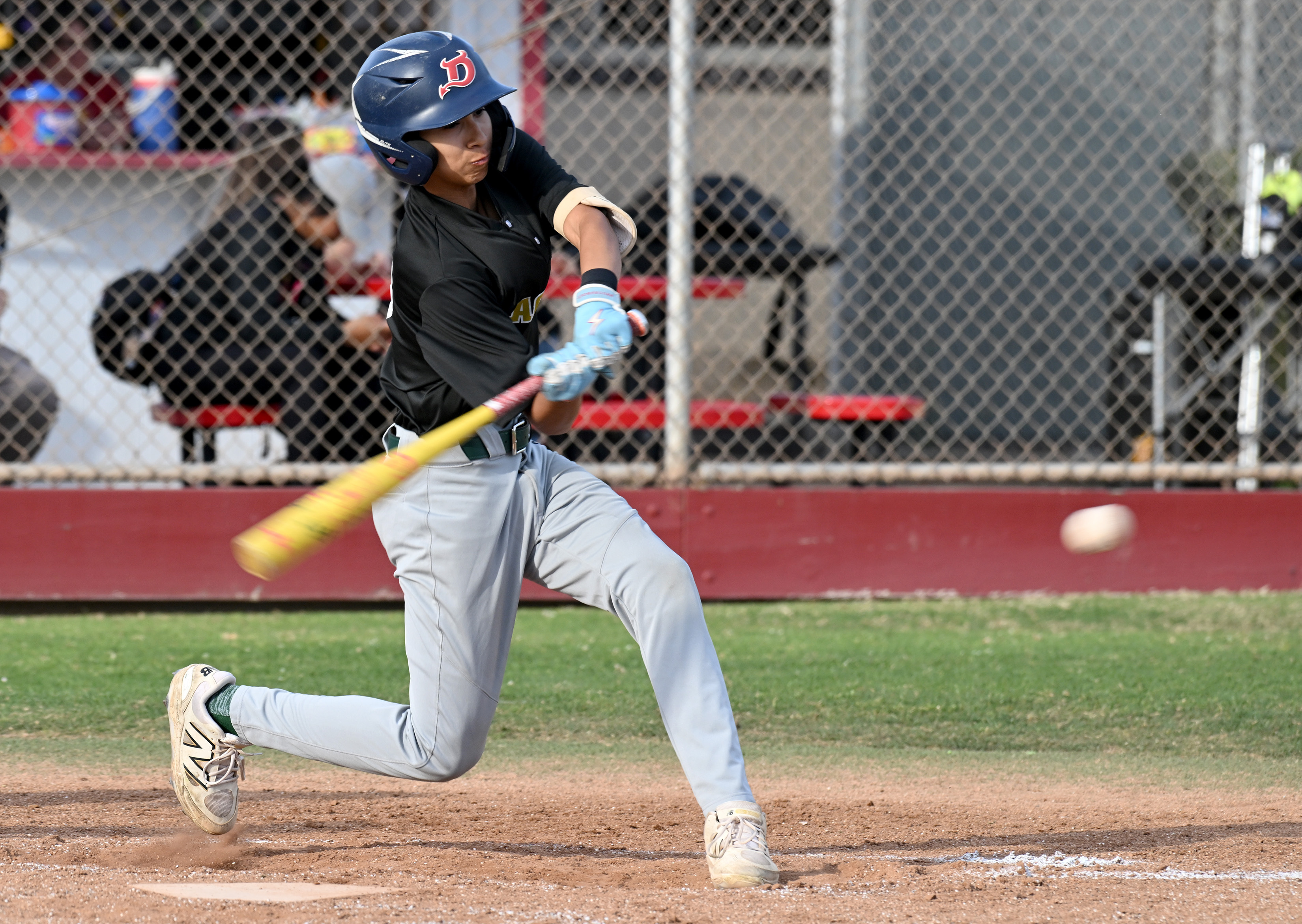 Cabrilloâs Daniel Jauregui hits against Wilson during opening day of...