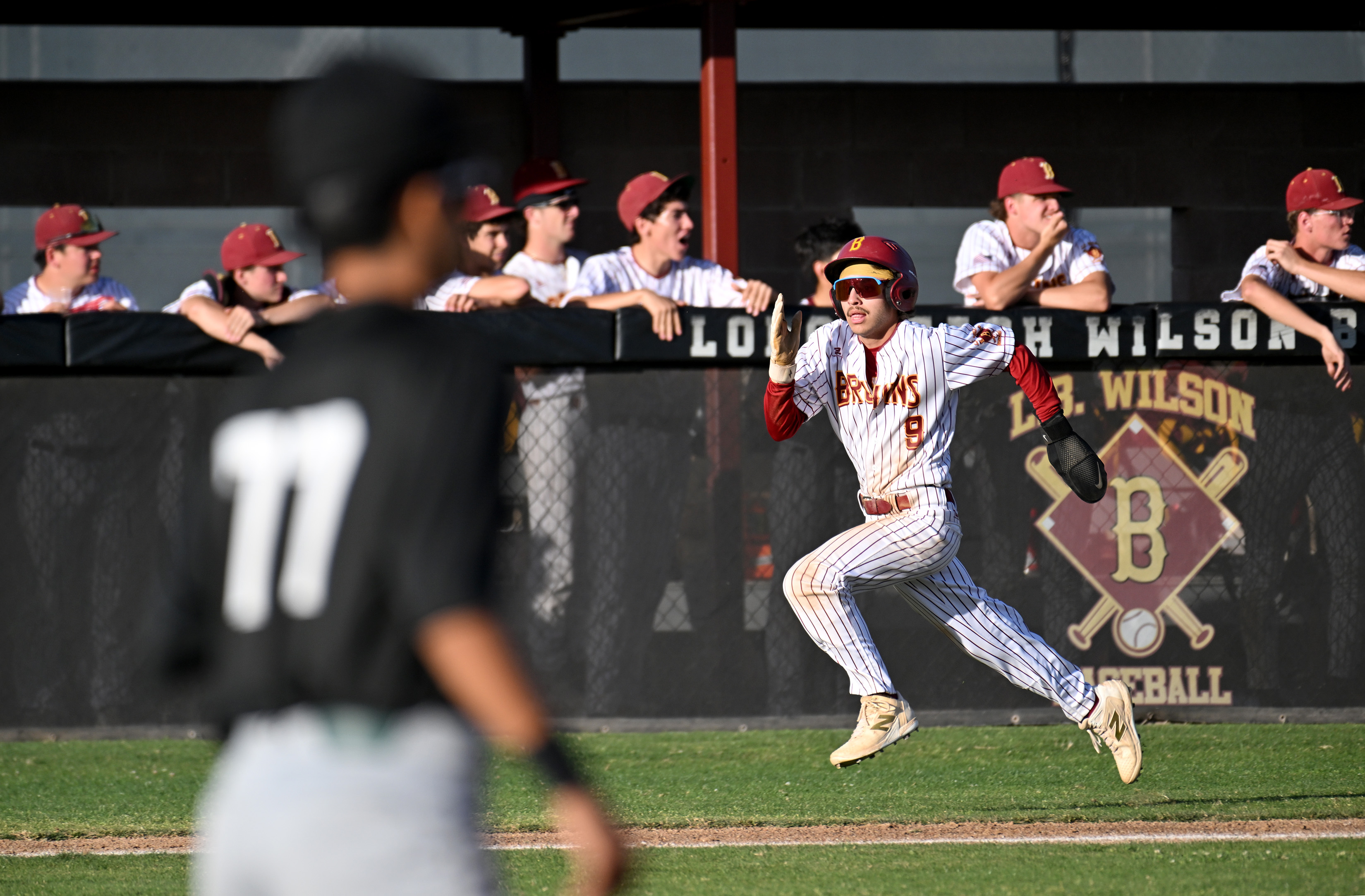 Wilsonâs Eric Juarez scores a run in the bottom of...