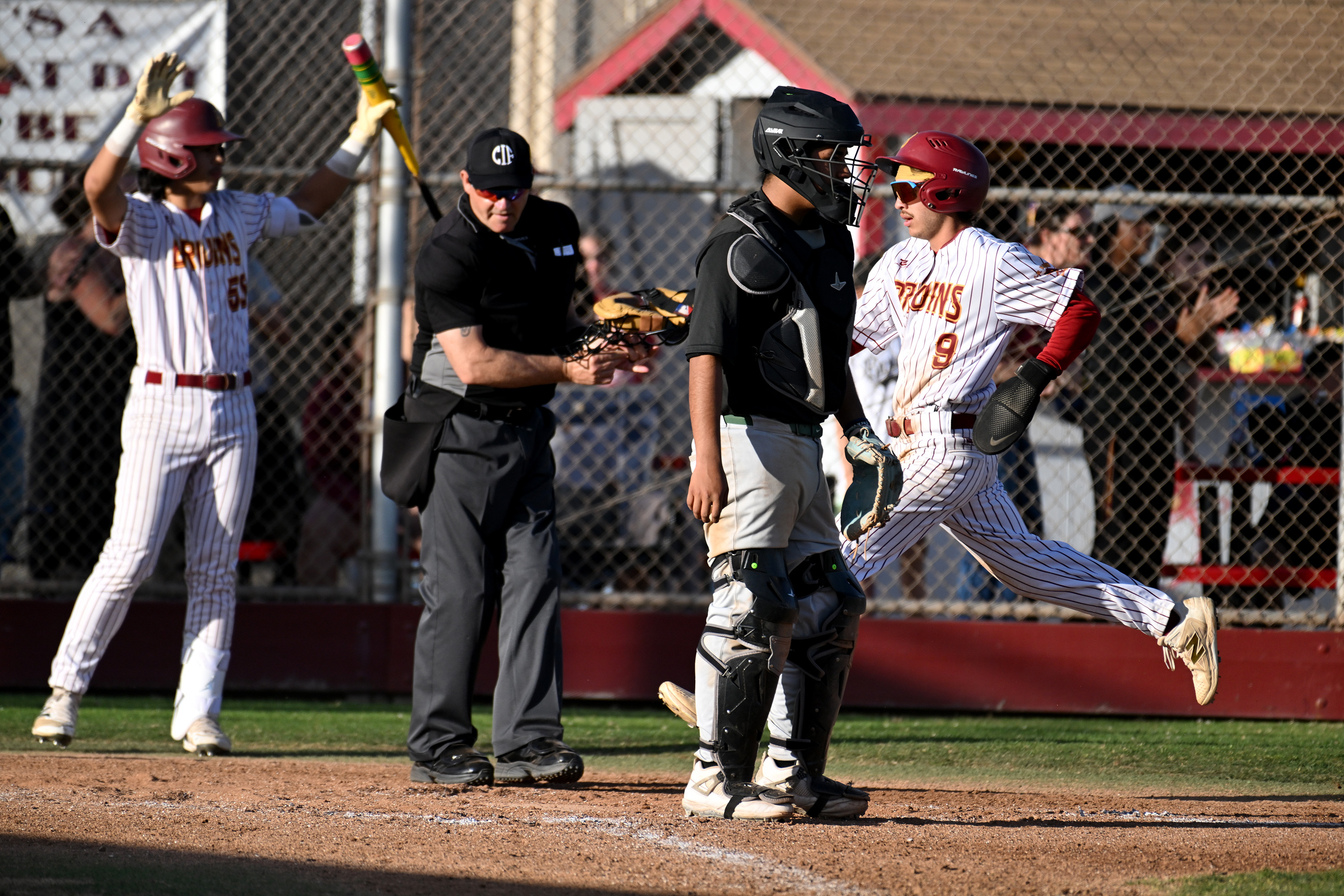 Wilsonâs Eric Juarez scores a run in the bottom of...