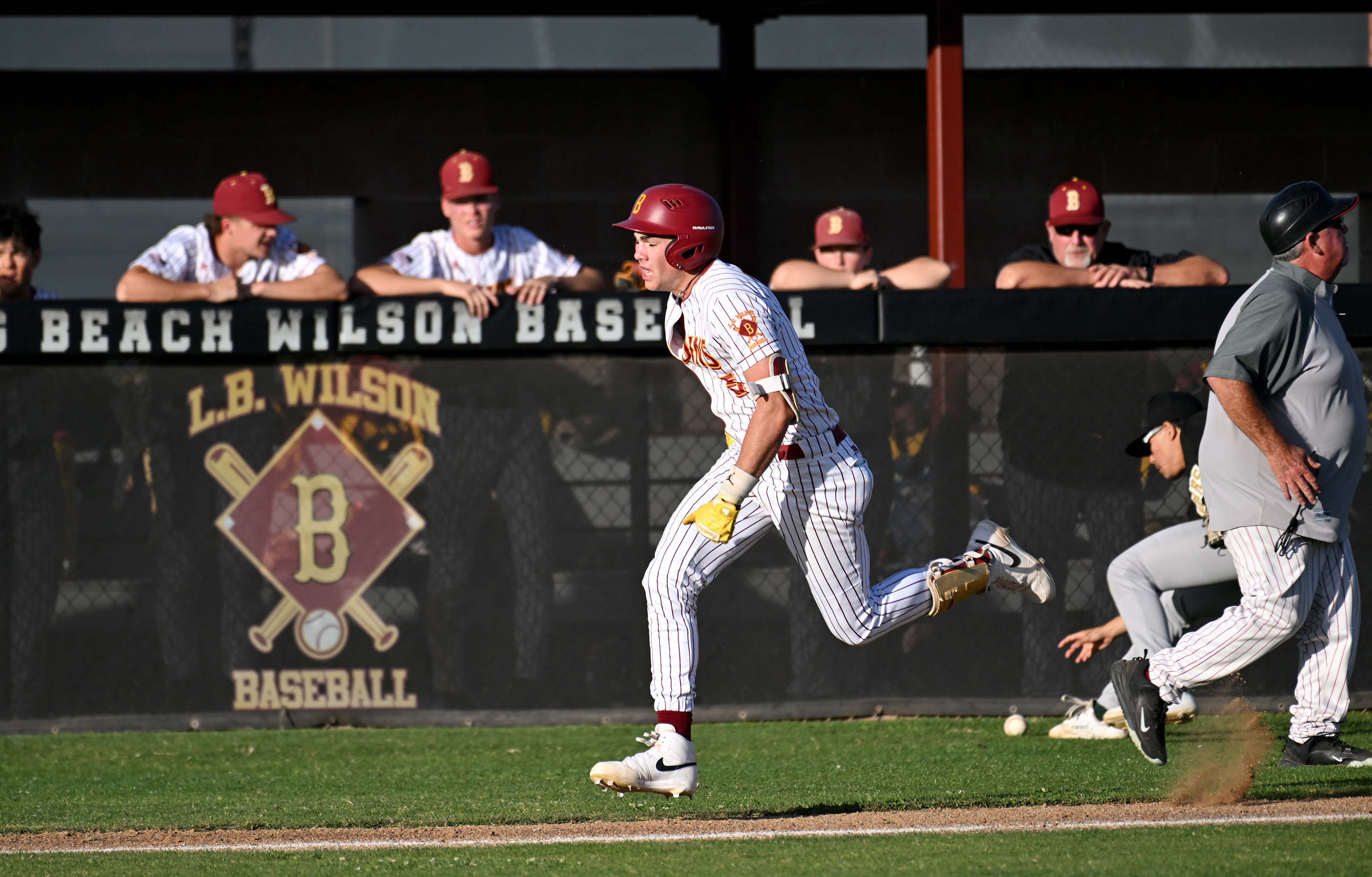 Wilsonâs Eddy Becker scores a run in the bottom of...