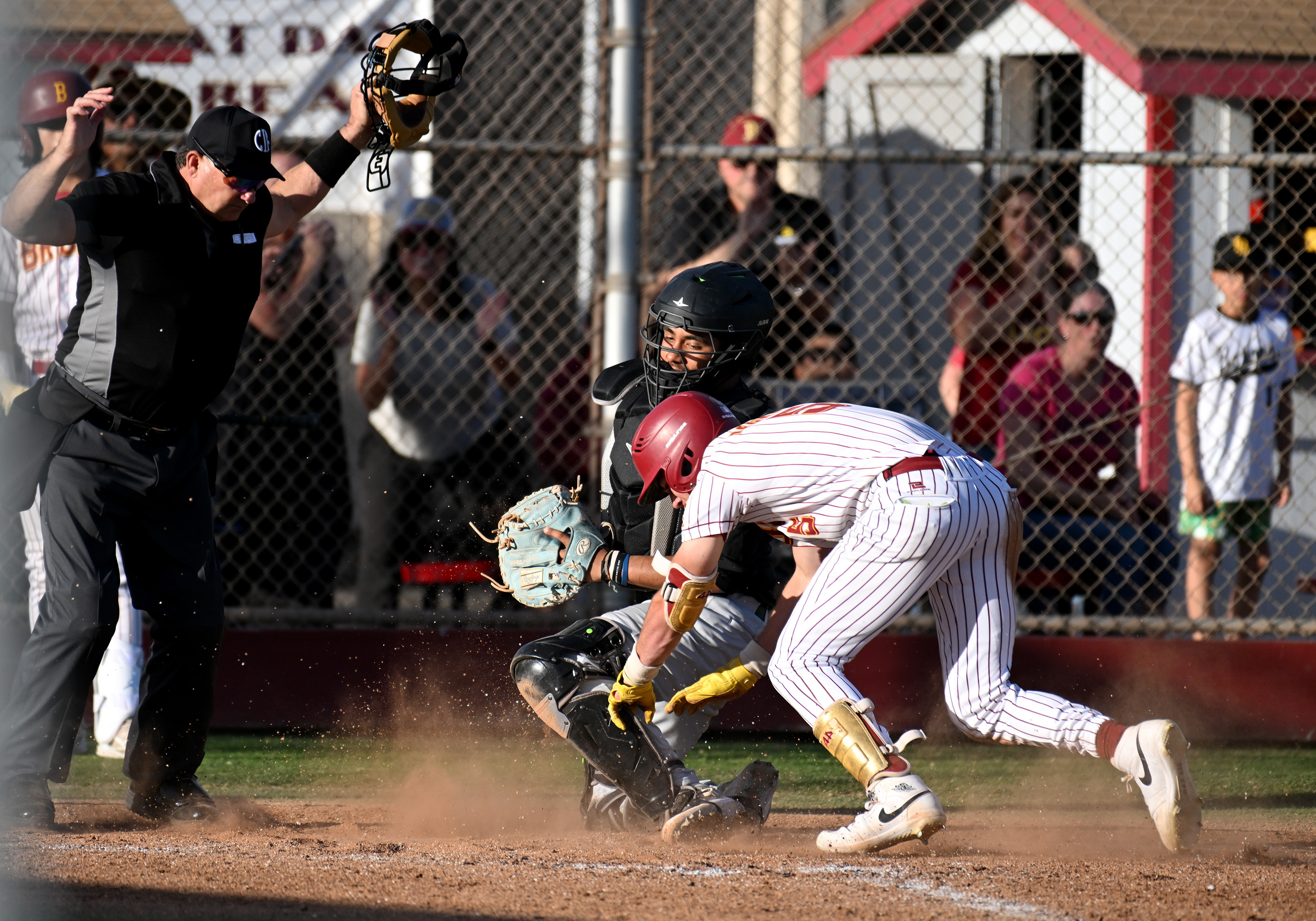 Wilsonâs Eddy Becker scores a run in the bottom of...