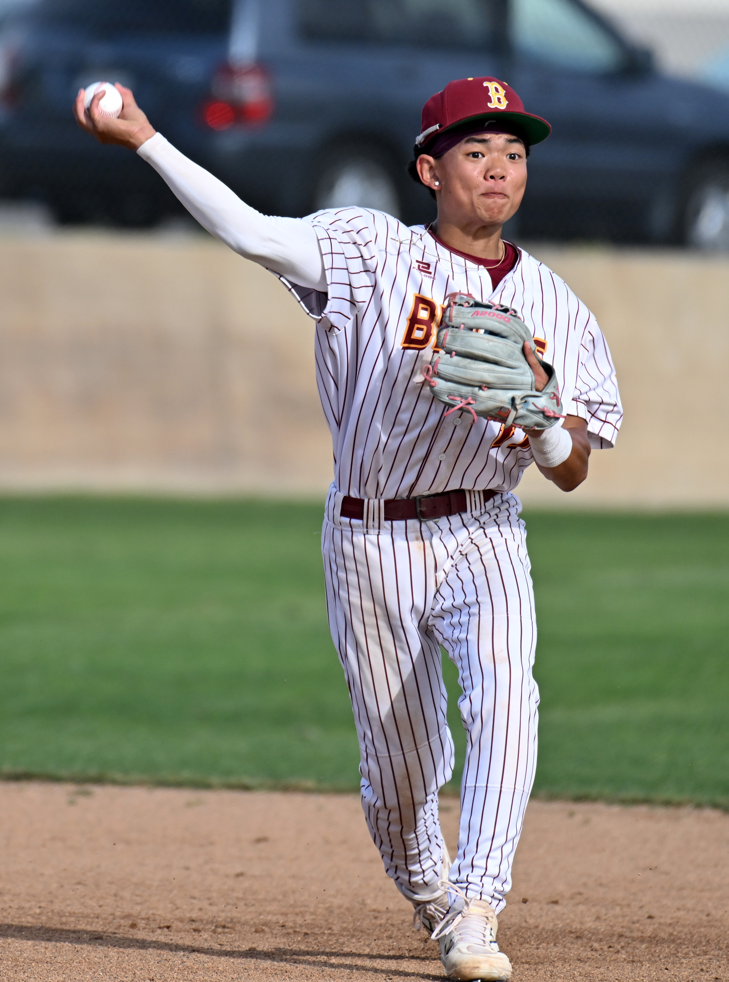 Wilsonâs Nicholas Thiem throws out a Cabrillo baserunner during opening...