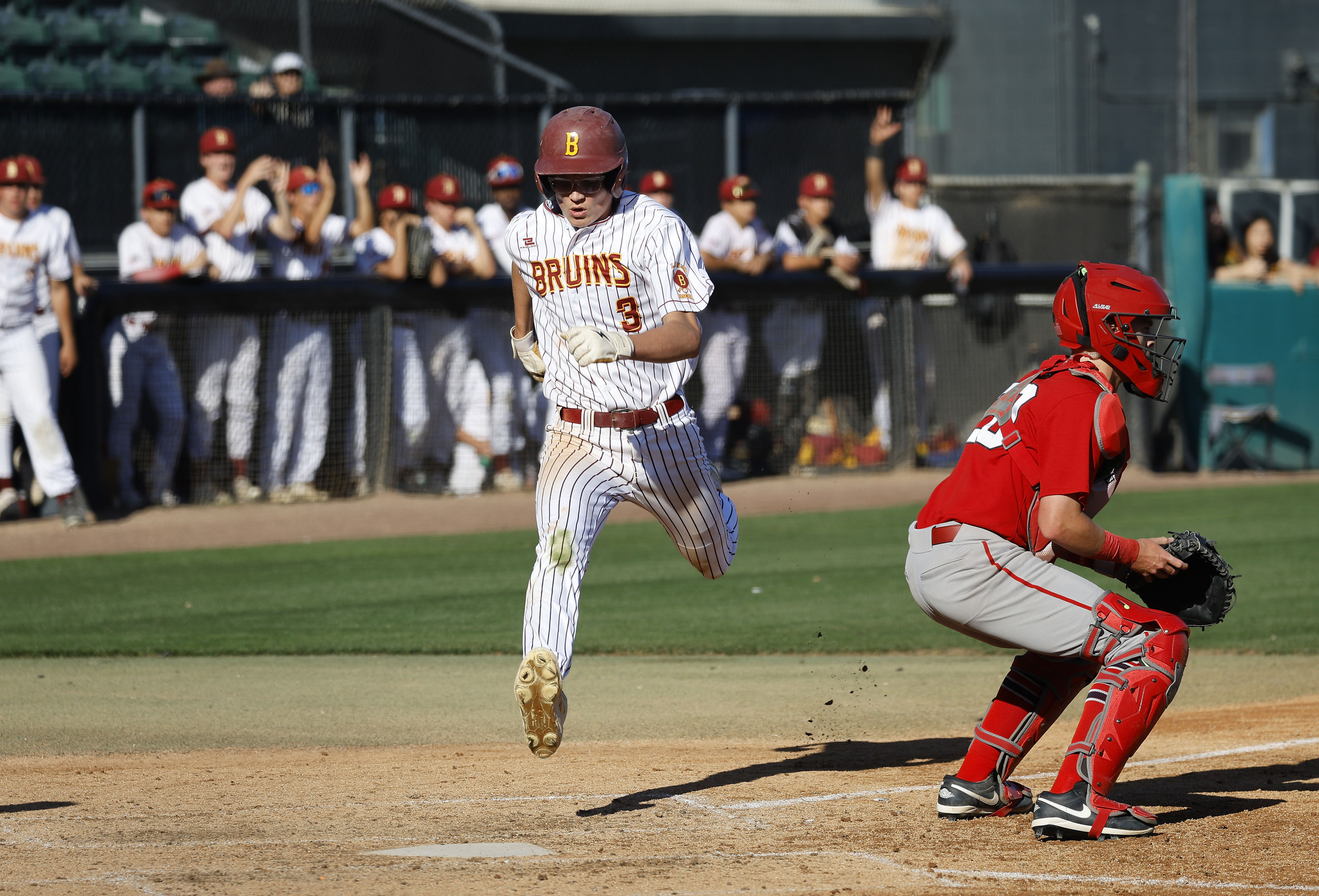 Wilson’s Cooper George scores for the Bruins as they take...