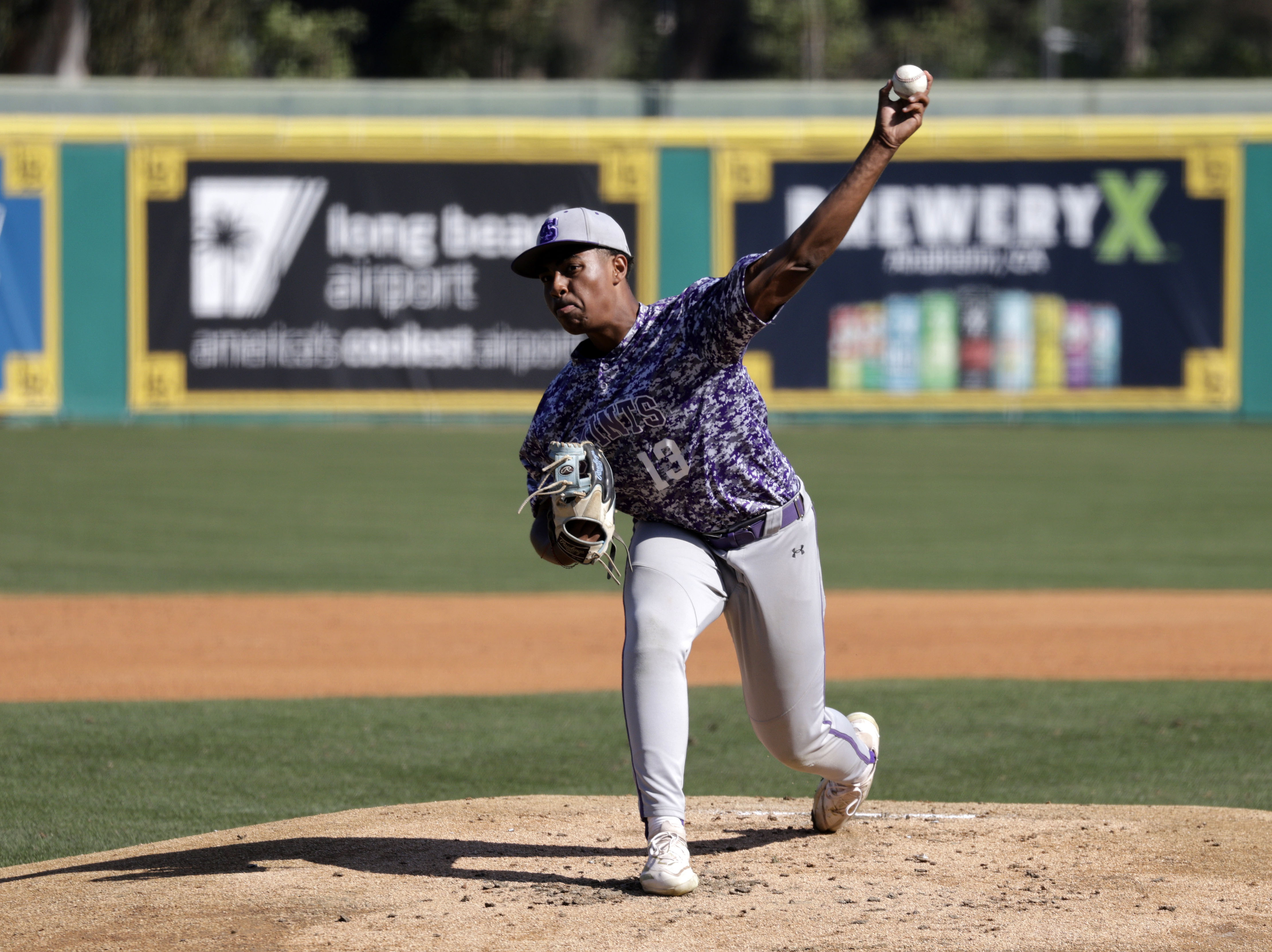 St. Anthony’s Jaylen Butler (13) gets things started for the...