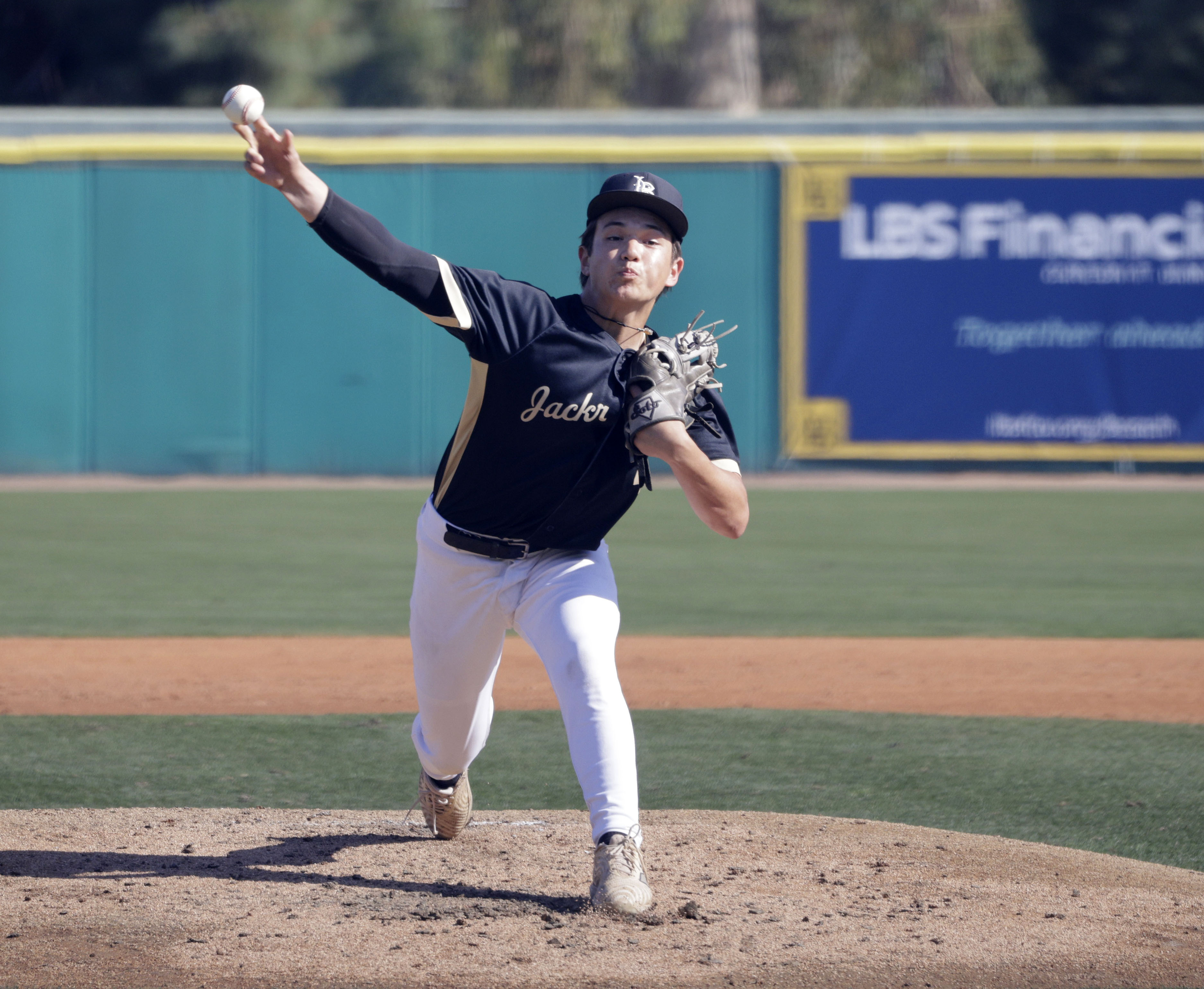 Long Beach Poly’s AZ Zuger (4) gets things going for...