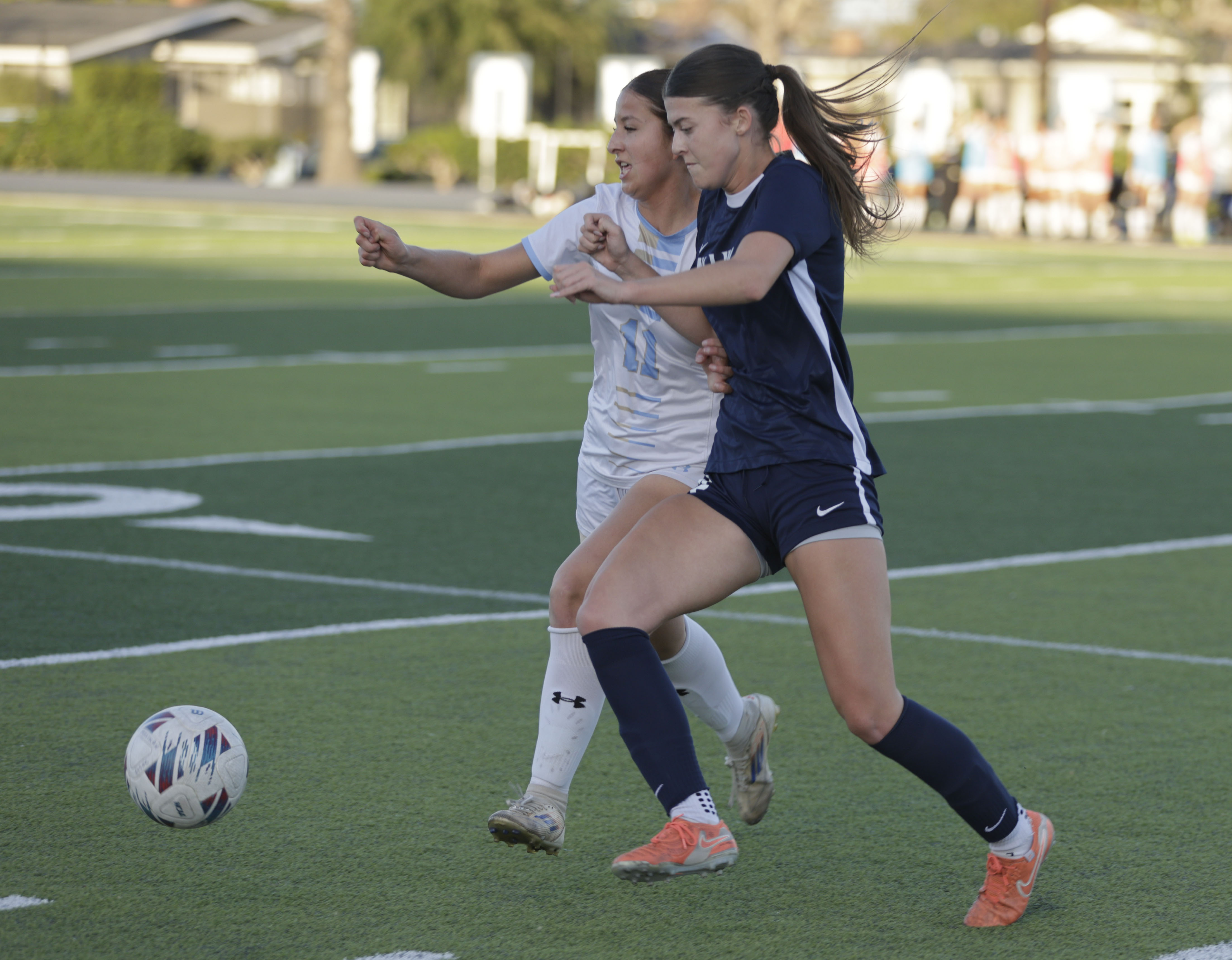 Quartz Hills Renata Videz (11) and Millikans CaoimheTighe (14) battle...