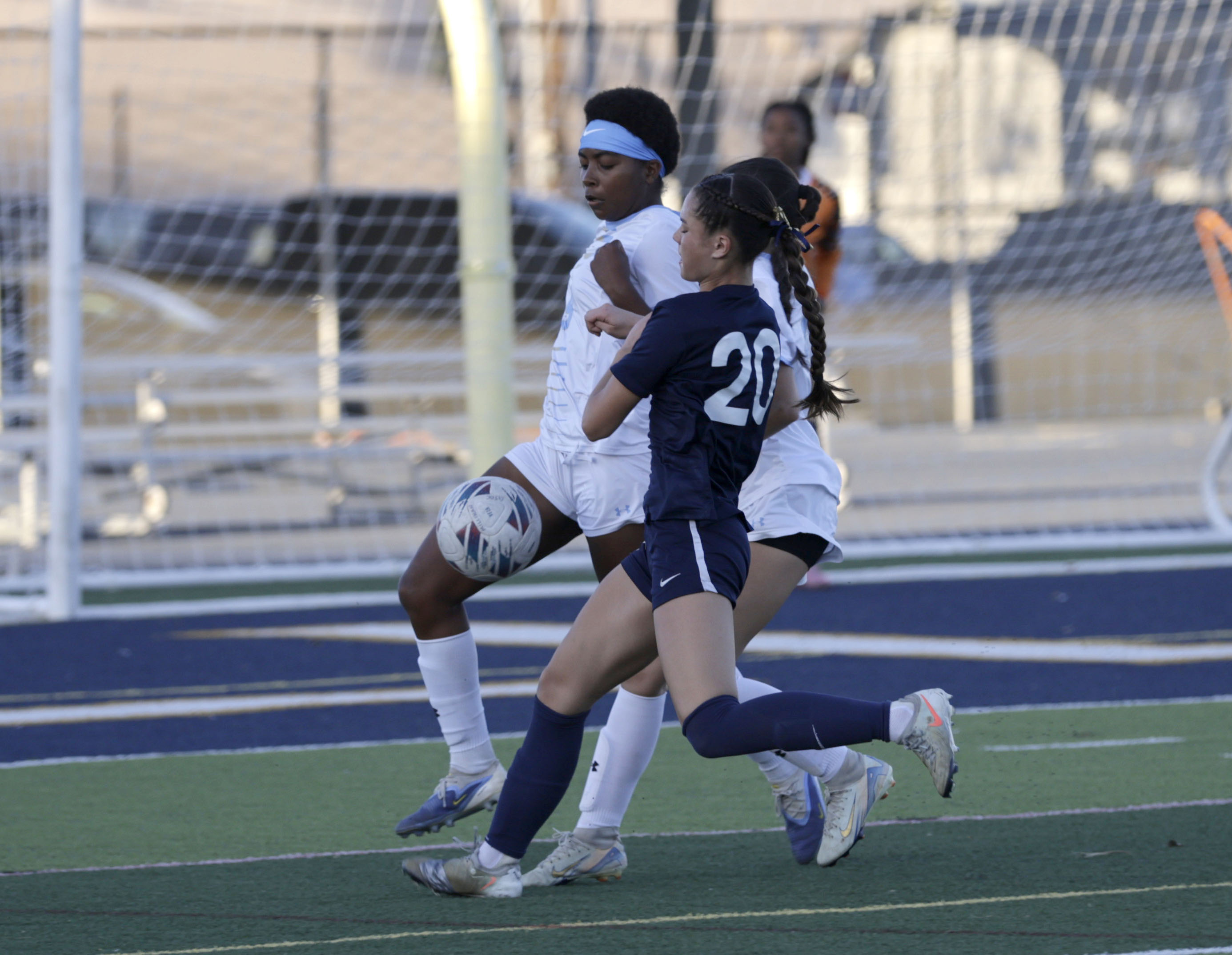 MIllikans Ellie Carungcong (20) and Quartz Hills Samantha Gray (9)...