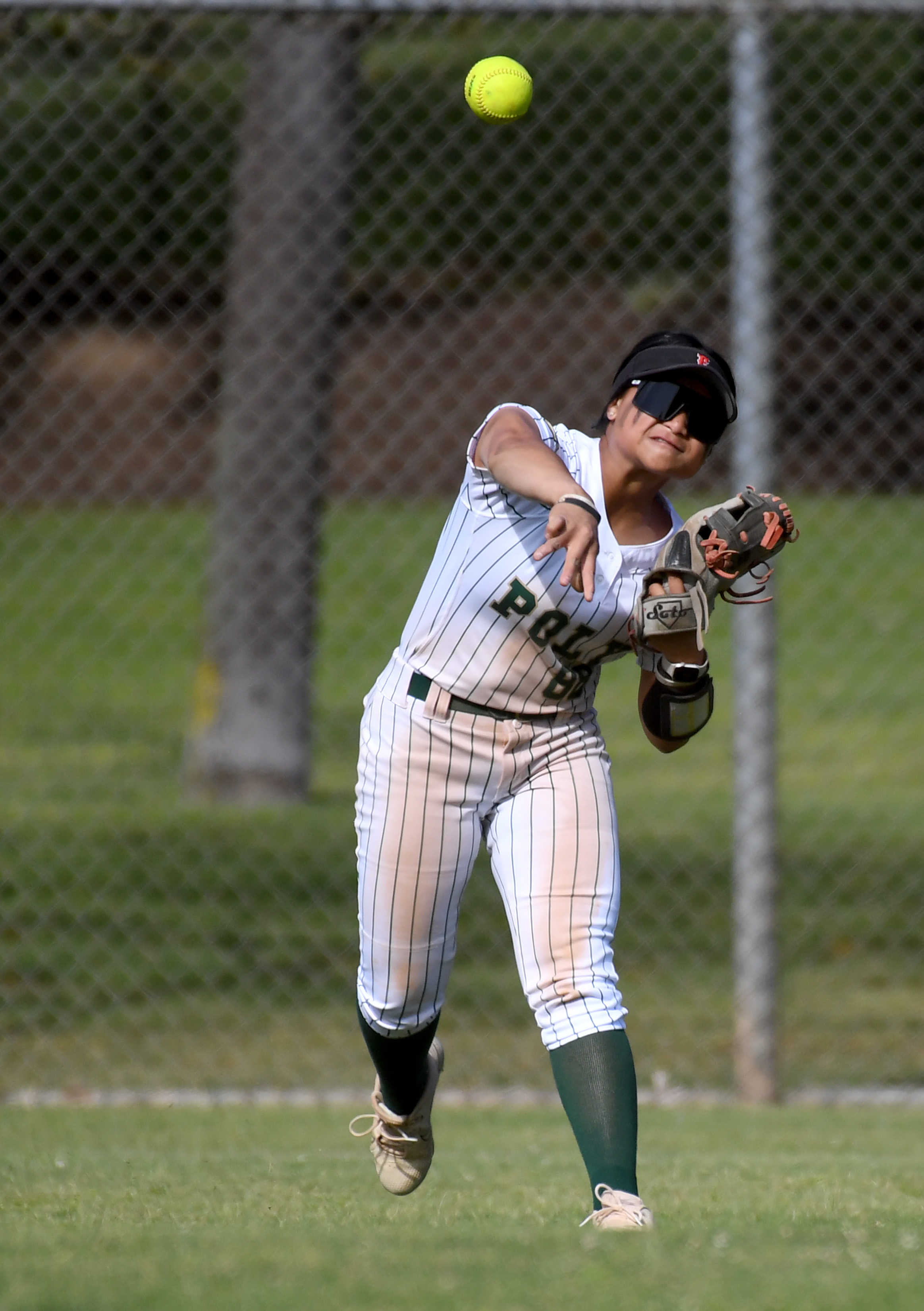 Long Beach Poly’s Persjah Lam Sam fields the ball during...