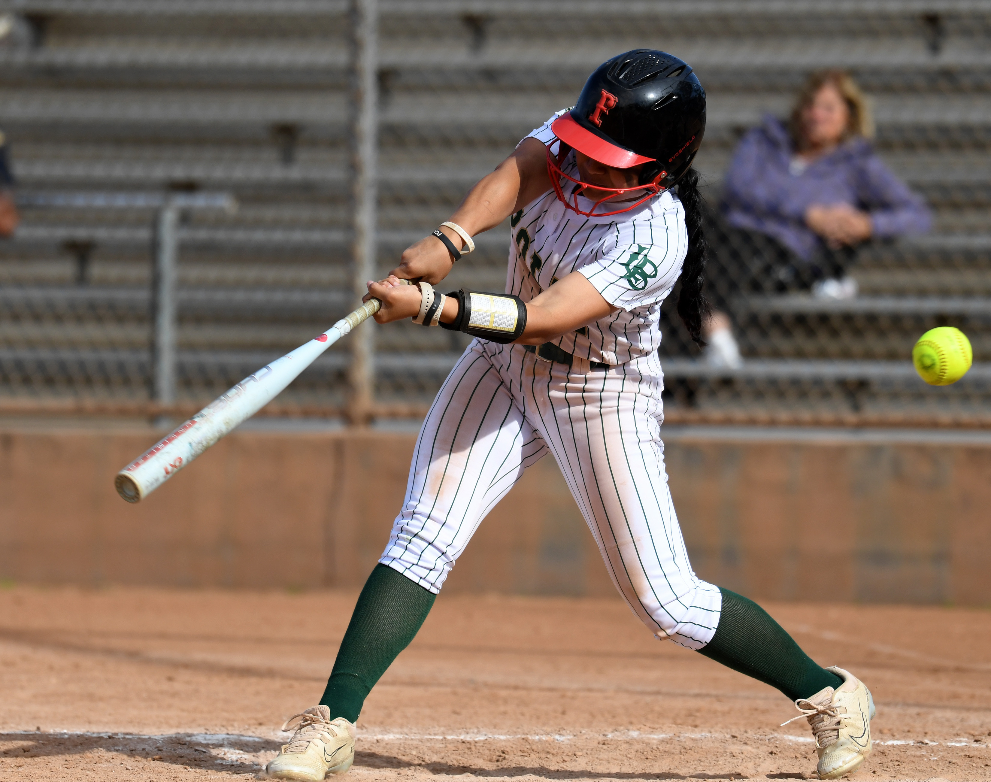 Long Beach Poly’s Persjah Lam Sam is at bat during...