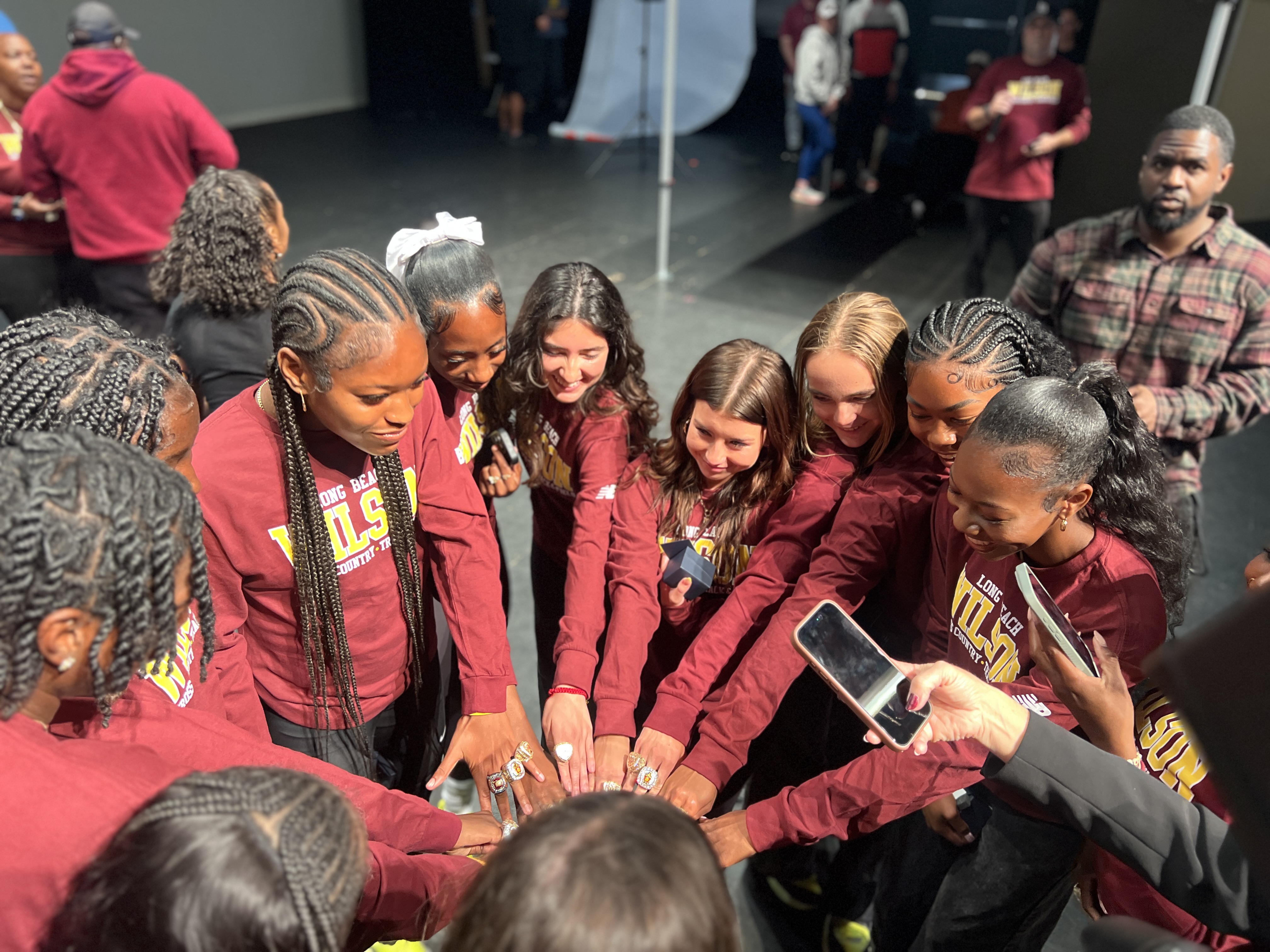The Long Beach Wilson girls track team held a championship...