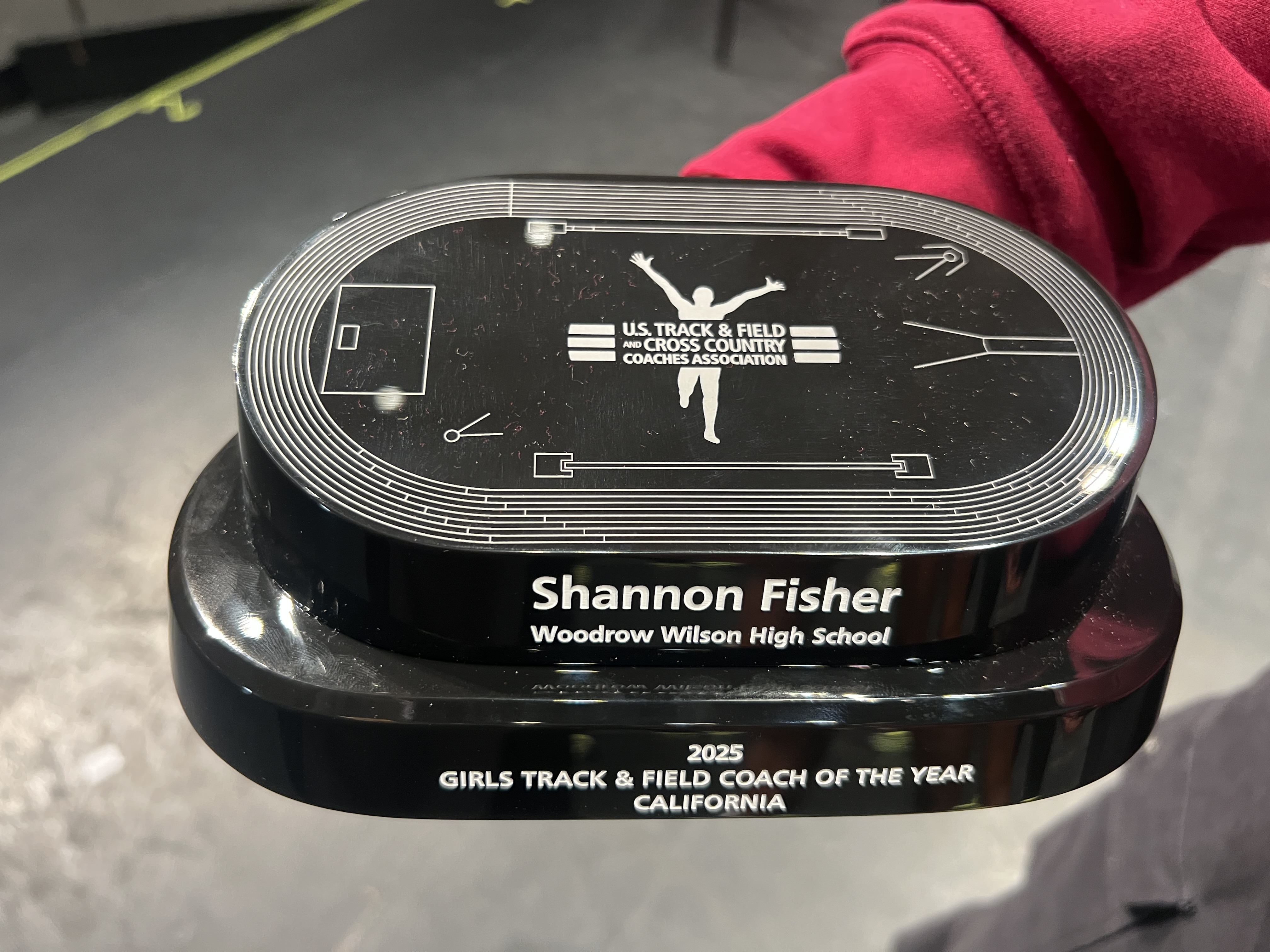 Long Beach Wilson track coach Shannon Fisher displays his 2025...