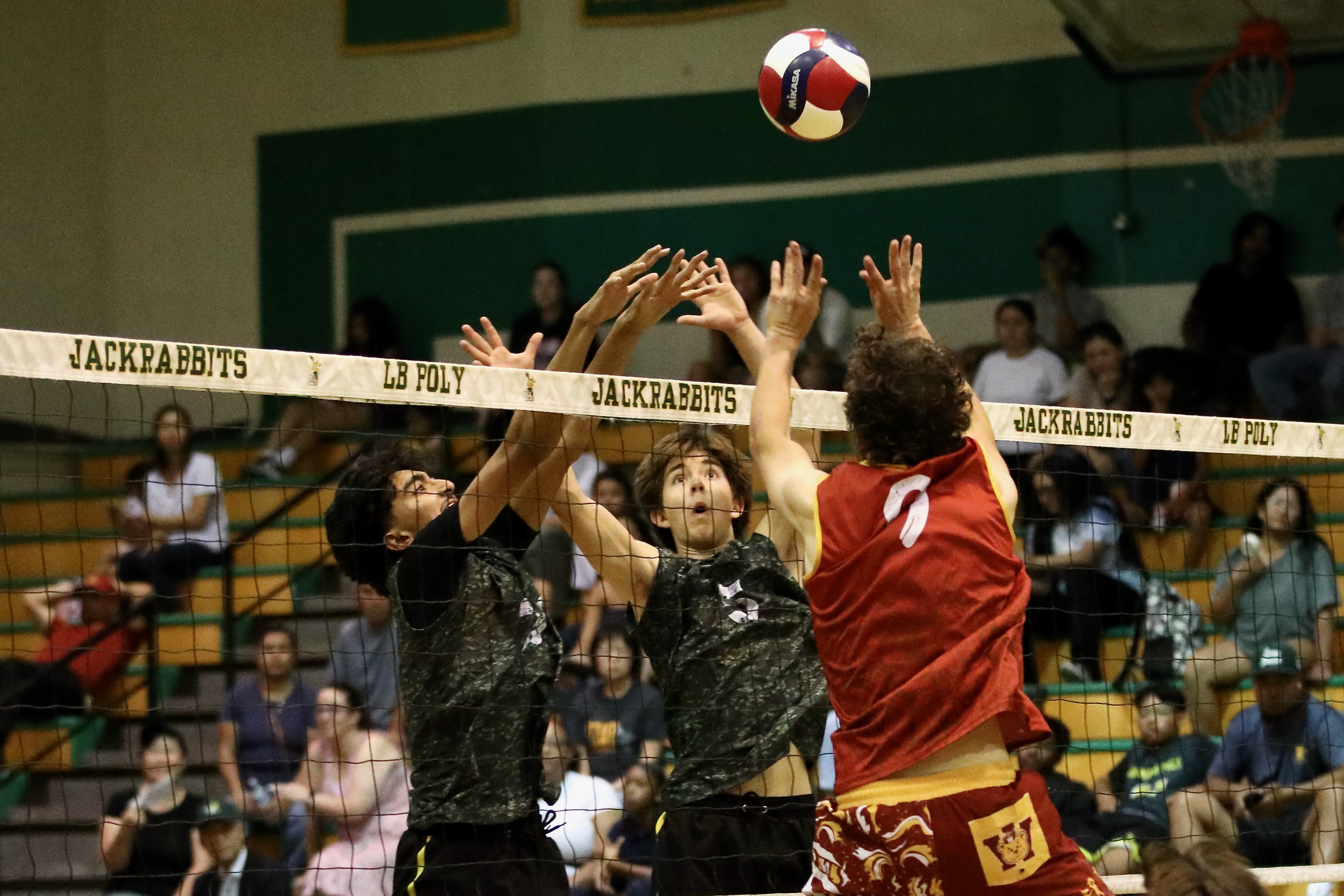 Long Beach Polyâs Wyatt Sheetz, middle, and teammate Shahi Ifrad...