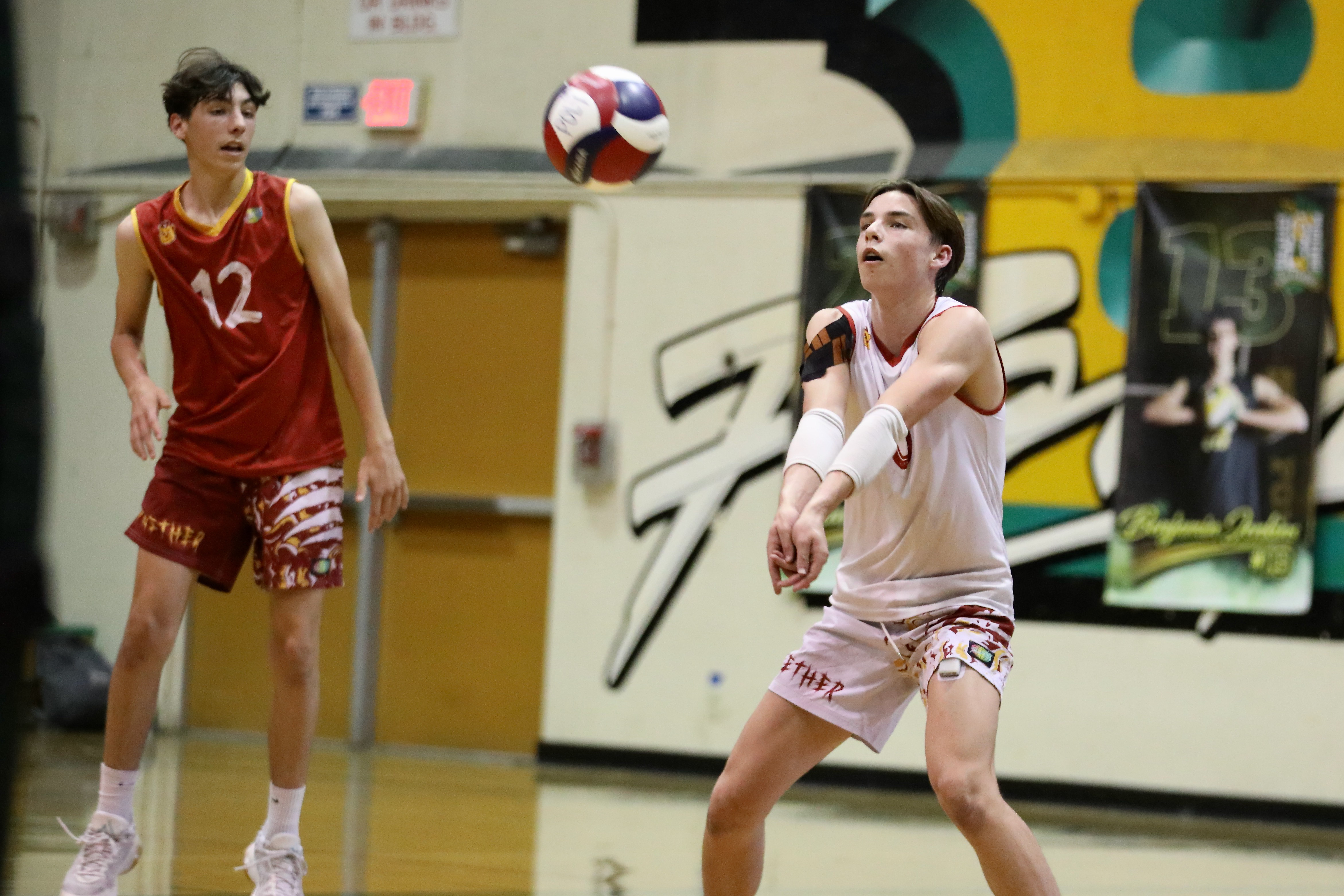 Wilson libero Blake Hardley returns a Long Beach Poly serve...