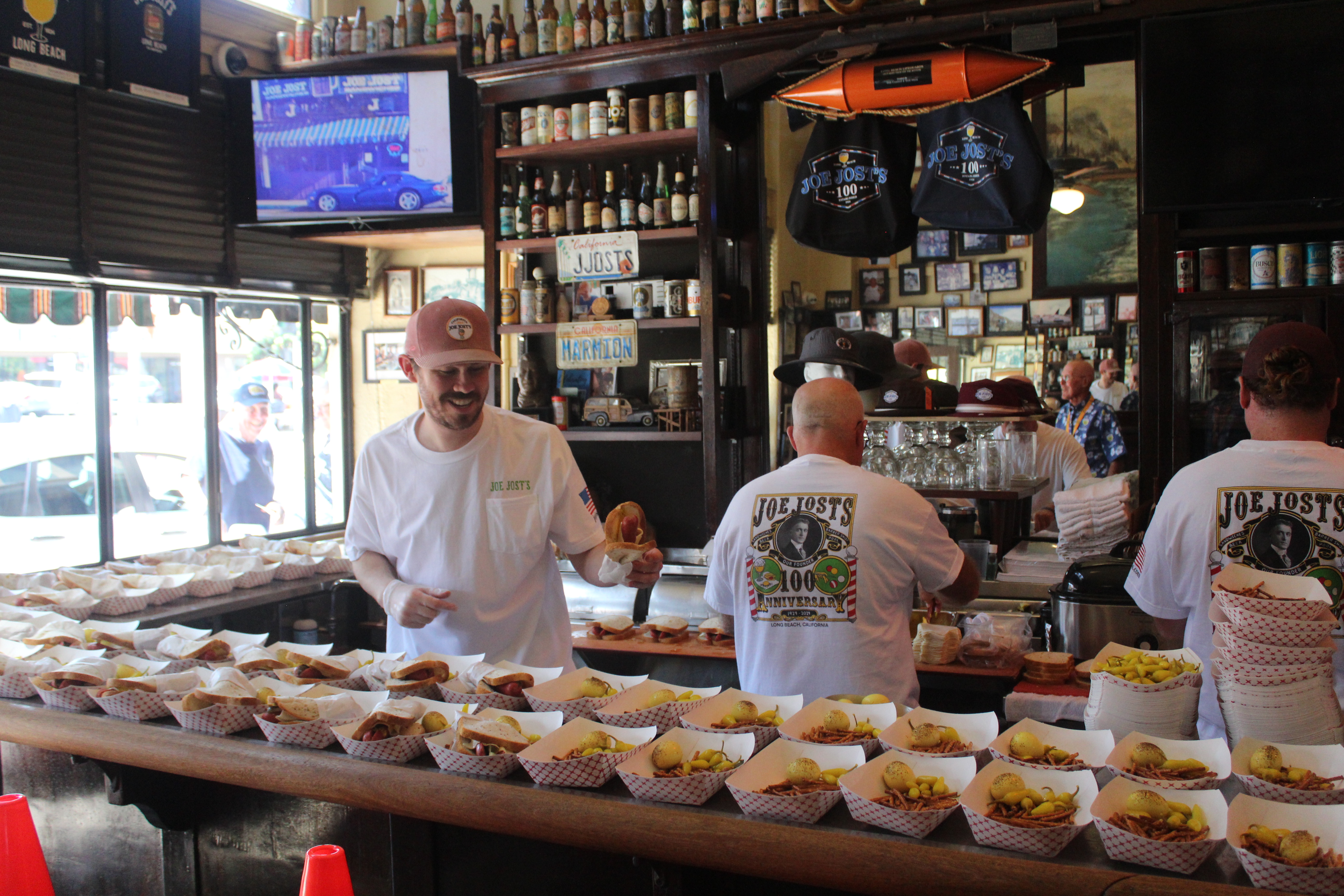 Joe Jost’s preparing the food for customers at the 100th...