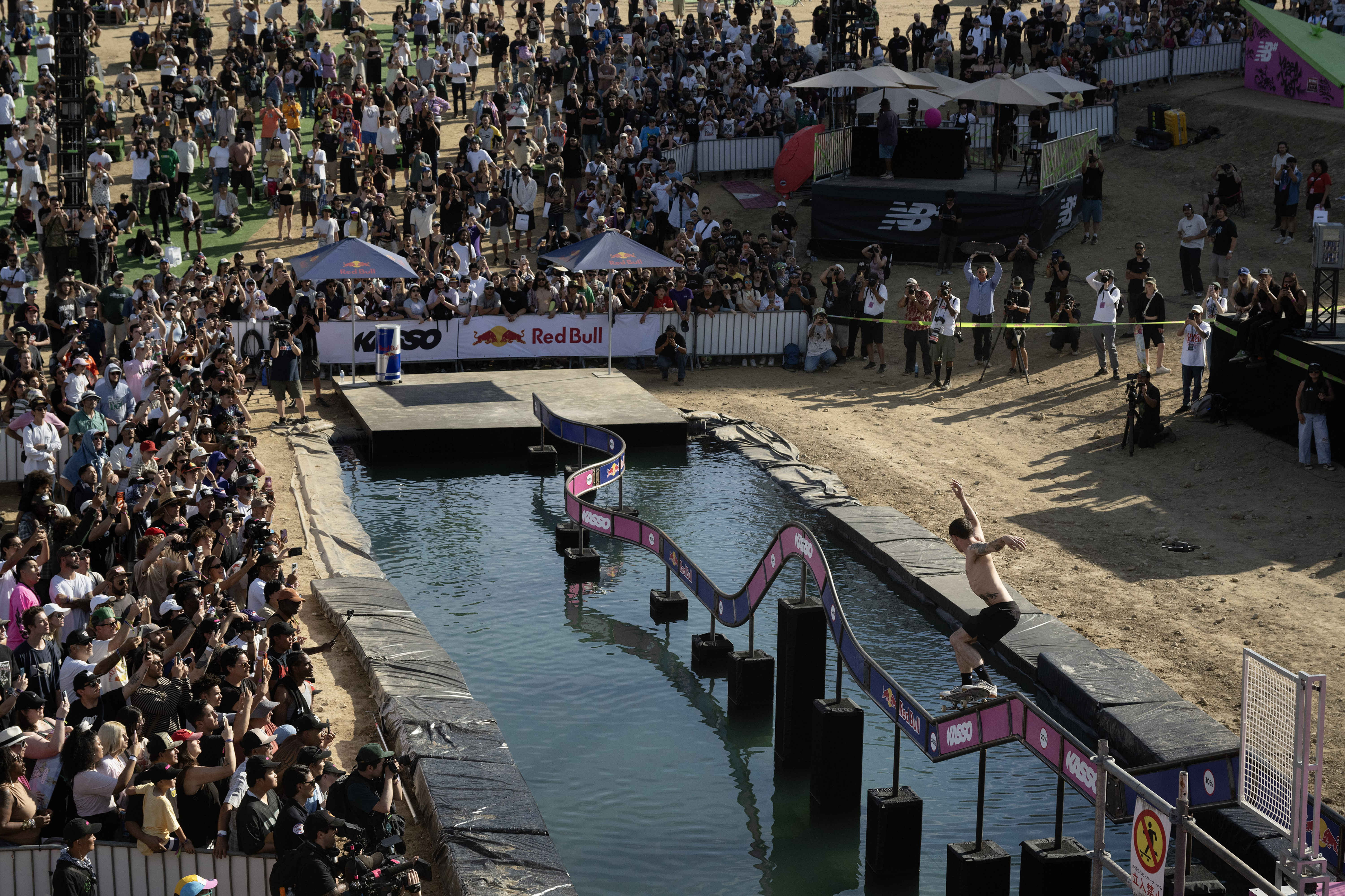 Kyle Walker grinds the railcoaster during the KASSO Fest Skate...
