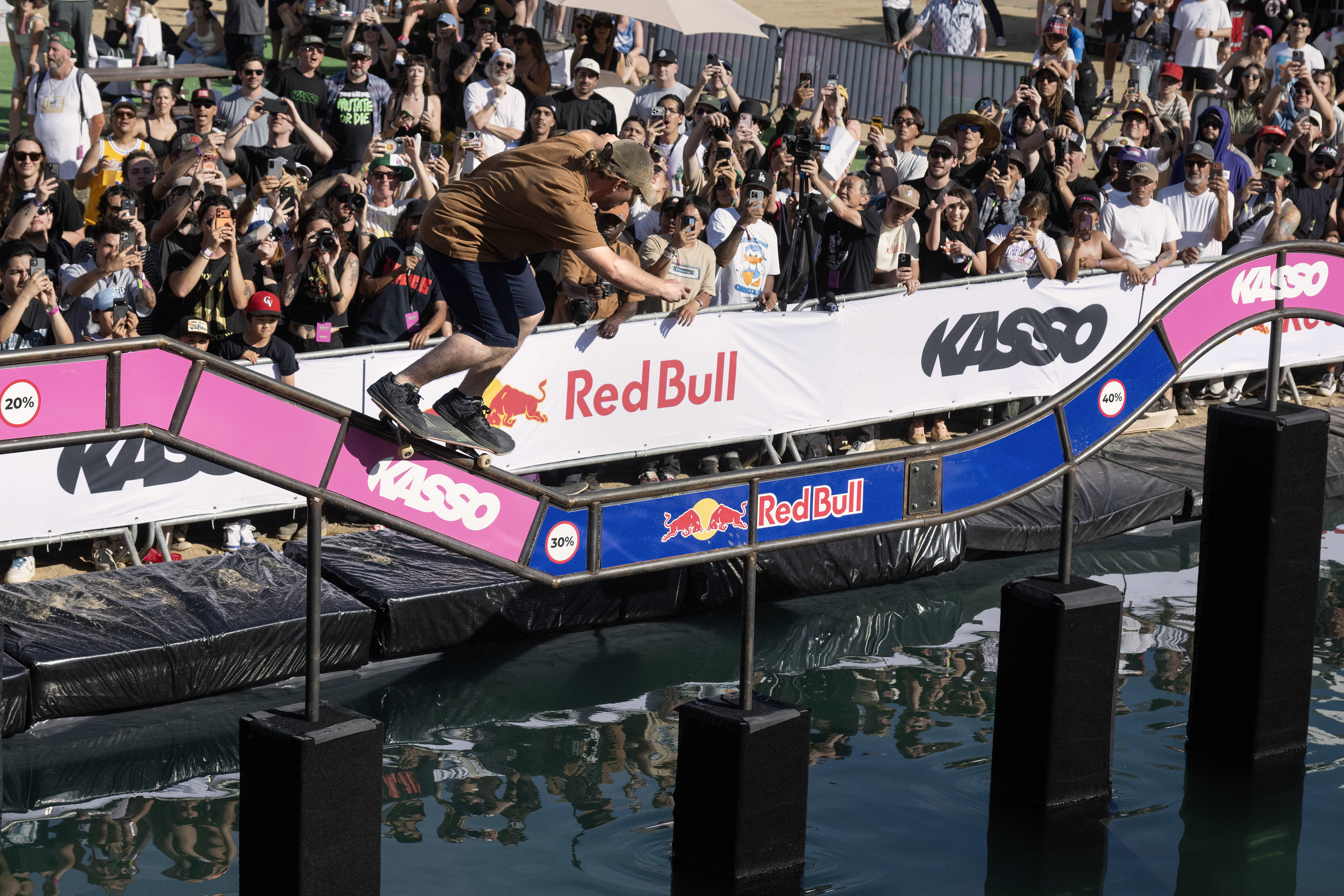 Jamie Foy attempts to grind the railcoaster during the KASSO...