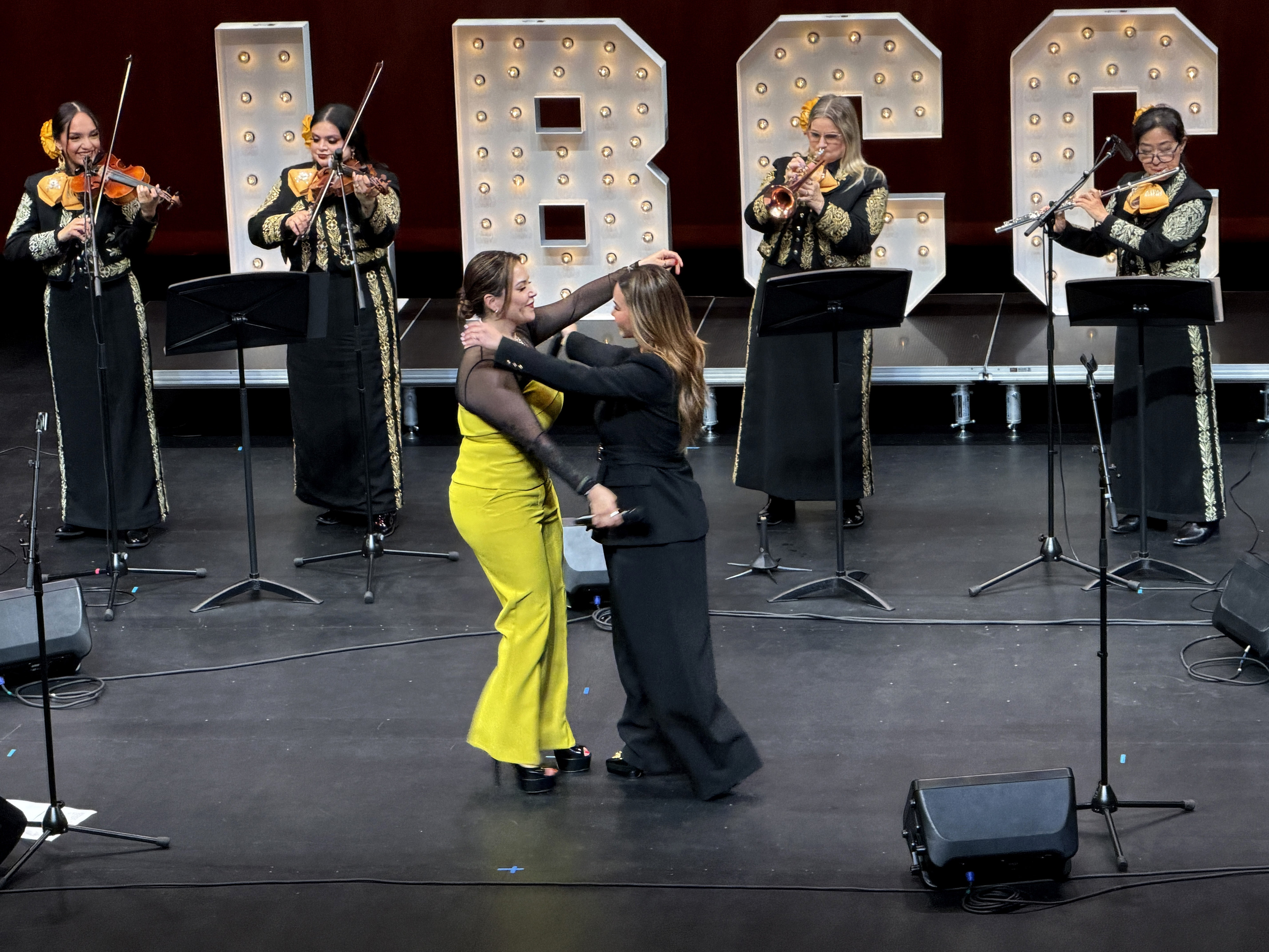 Chiquis and Jacqie Rivera get emotional during a song they...