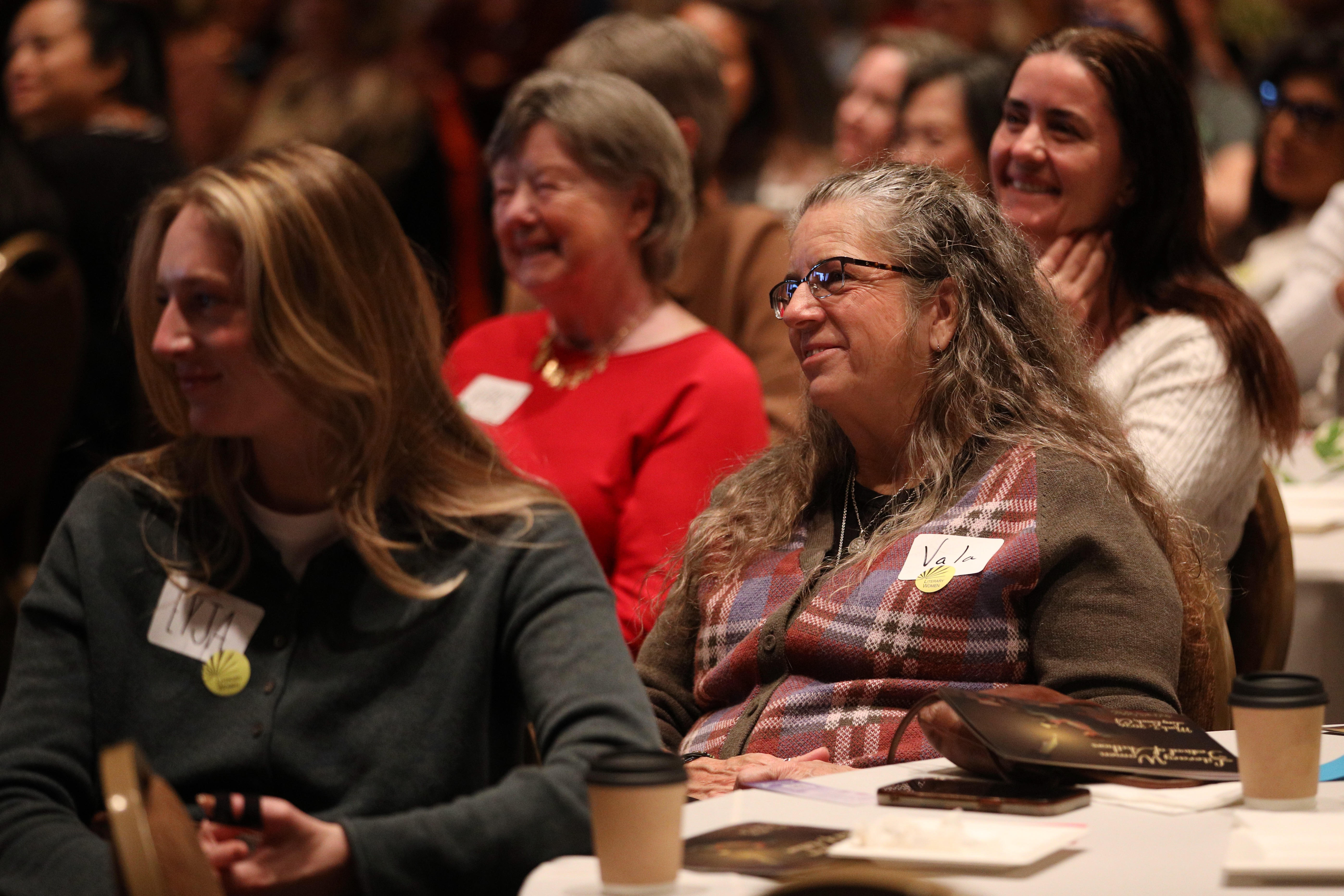 Attendees fill the ballroom for the sold-out Literary Women Festival...