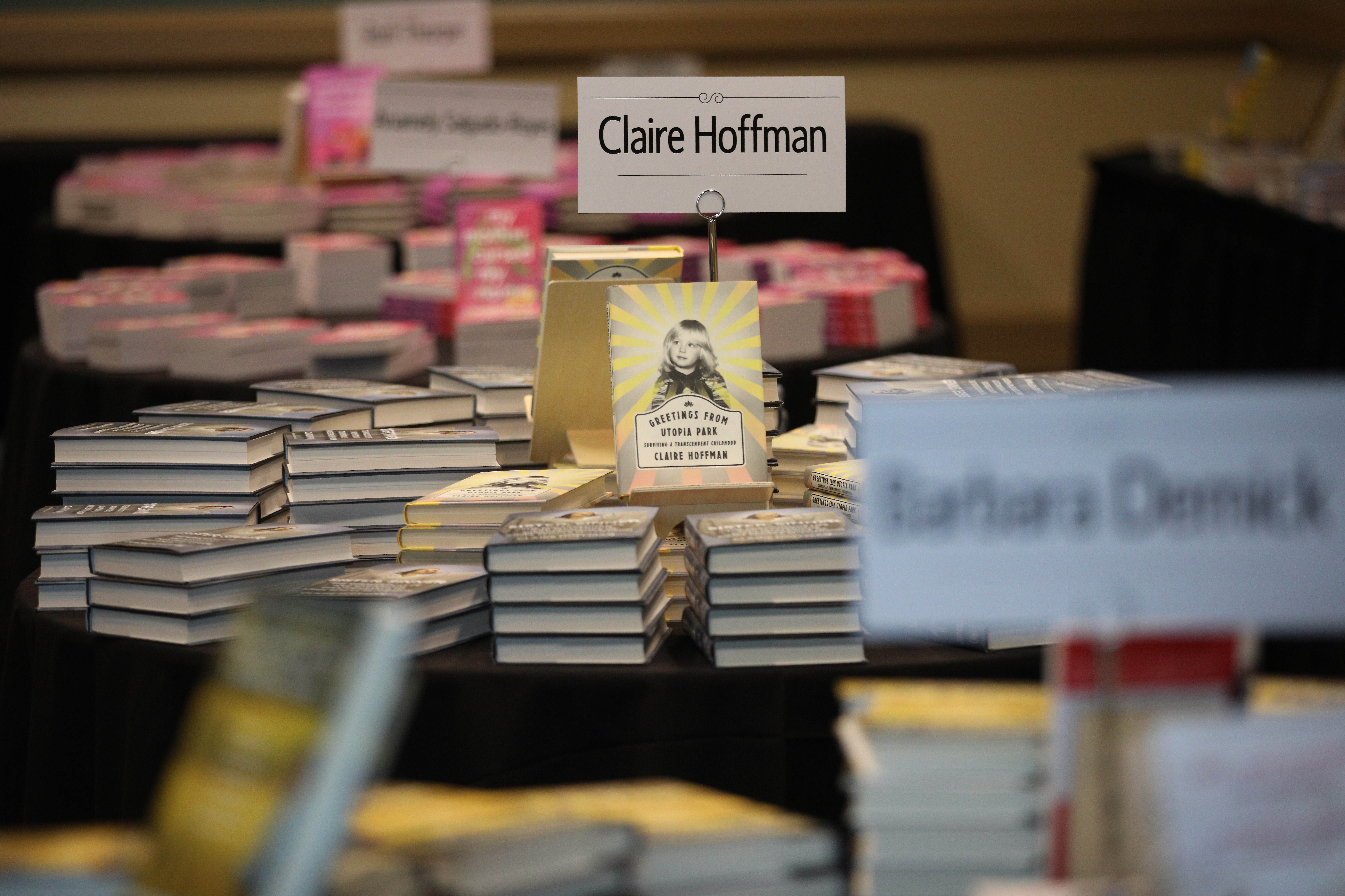 Books by this yearâs guest speakers are displayed at the...