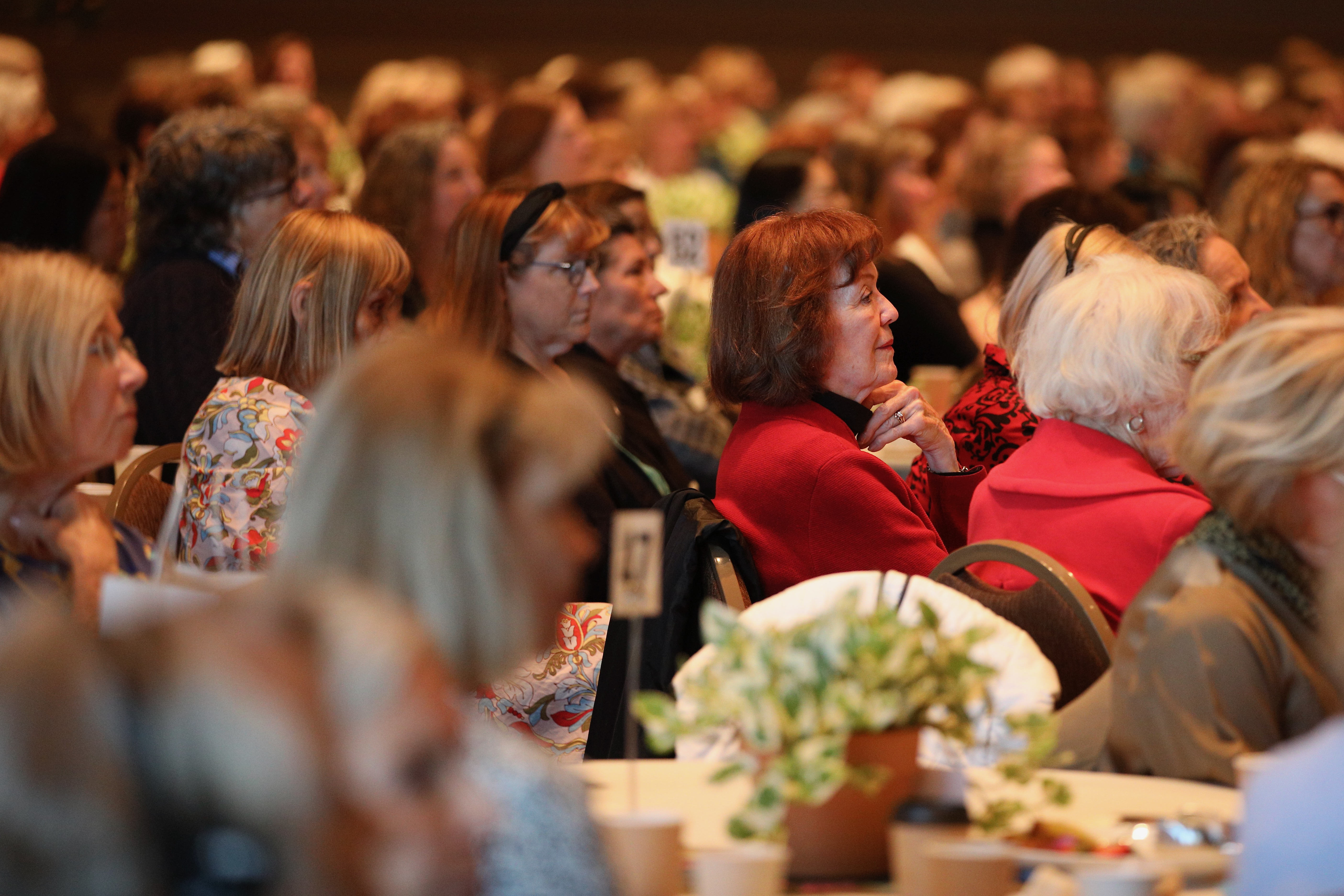 Attendees fill the ballroom for the sold-out Literary Women Festival...