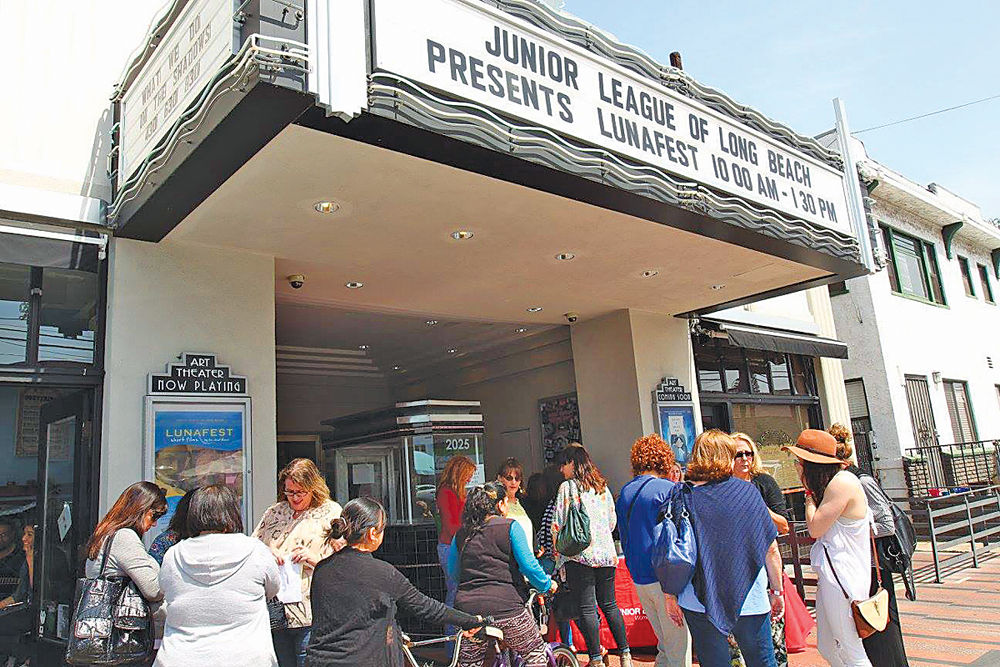 Lunafest attendees line up to enter The Art Theatre of...