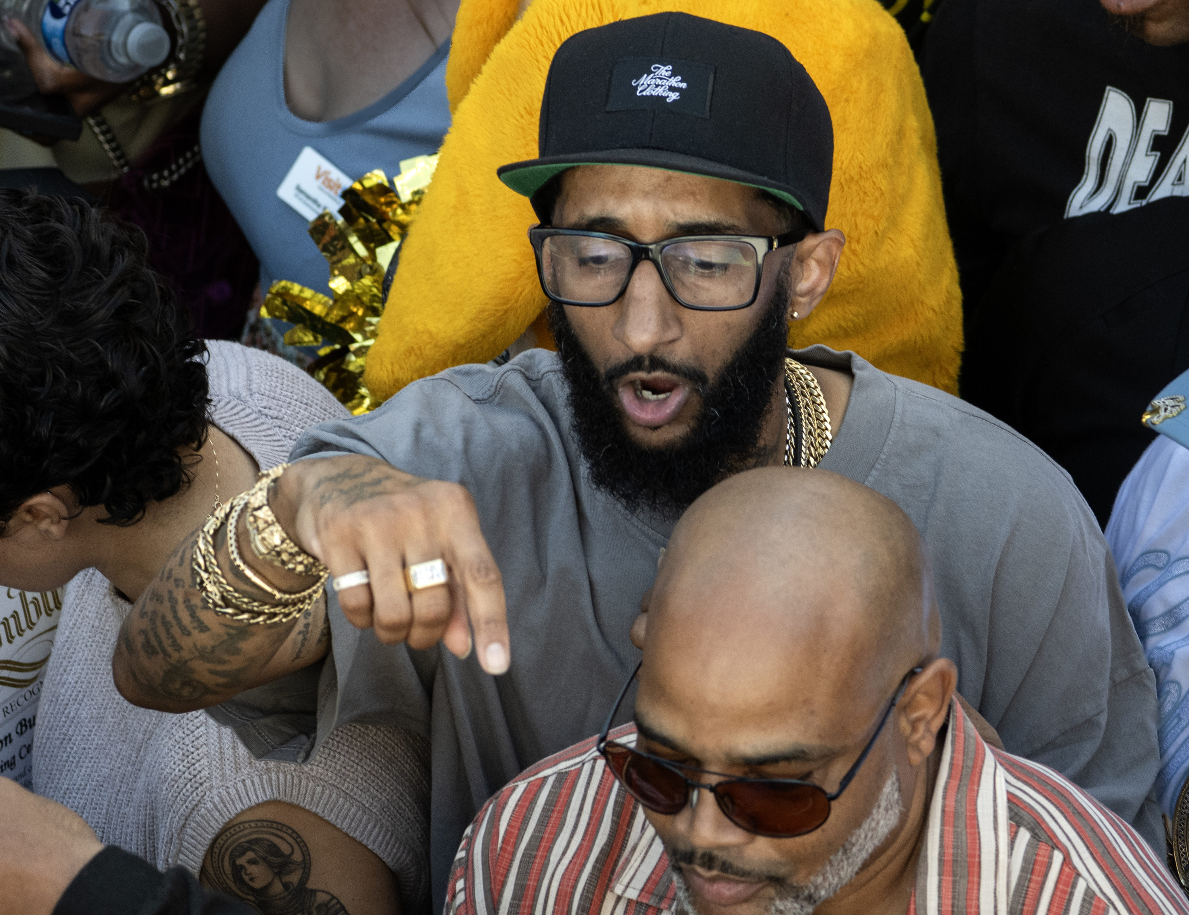 Blacc Sam, the brother of murdered rapper Nipsey Hussle, pushes...