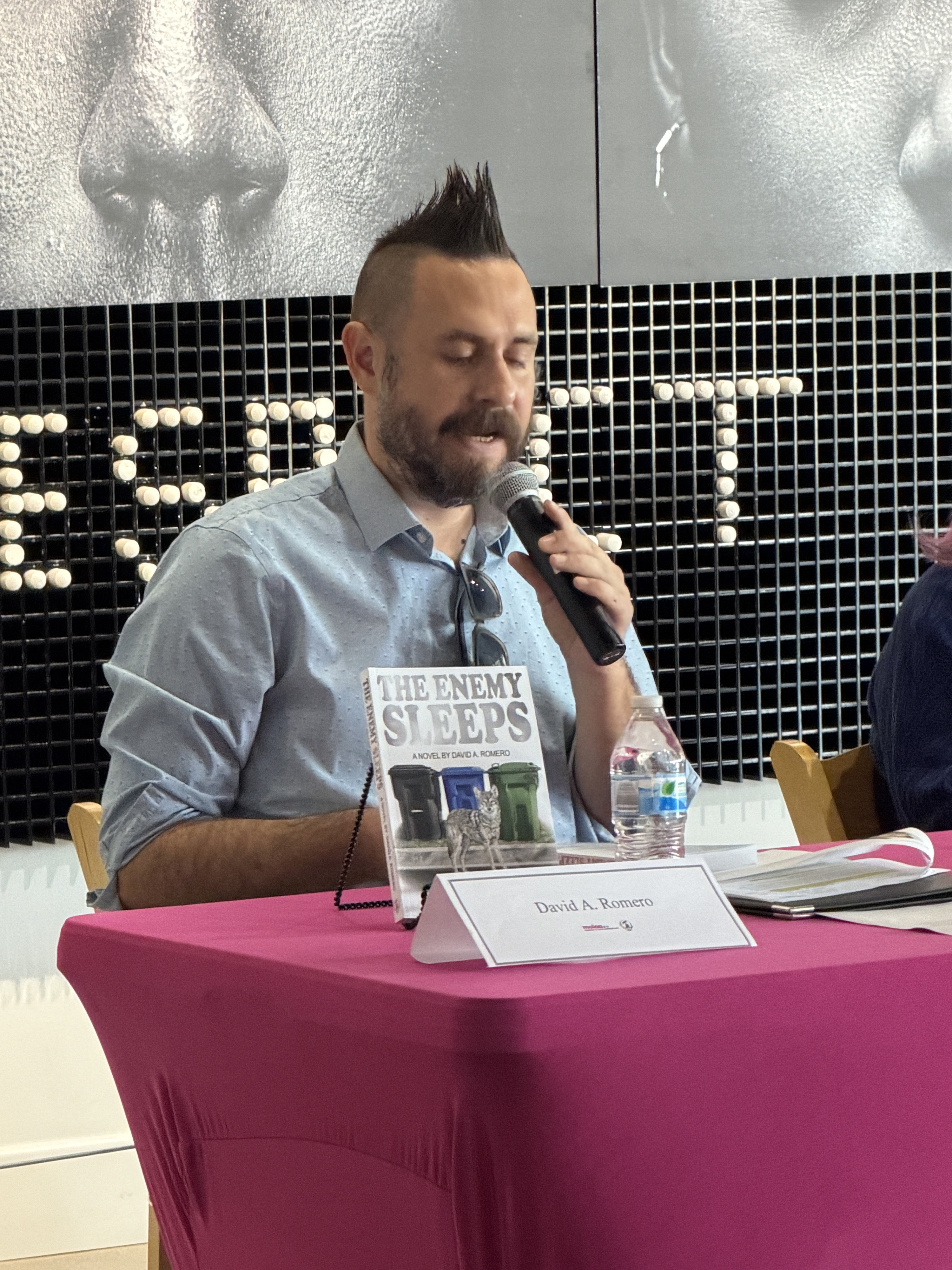 David Romero reads the character introduction for his new book,...