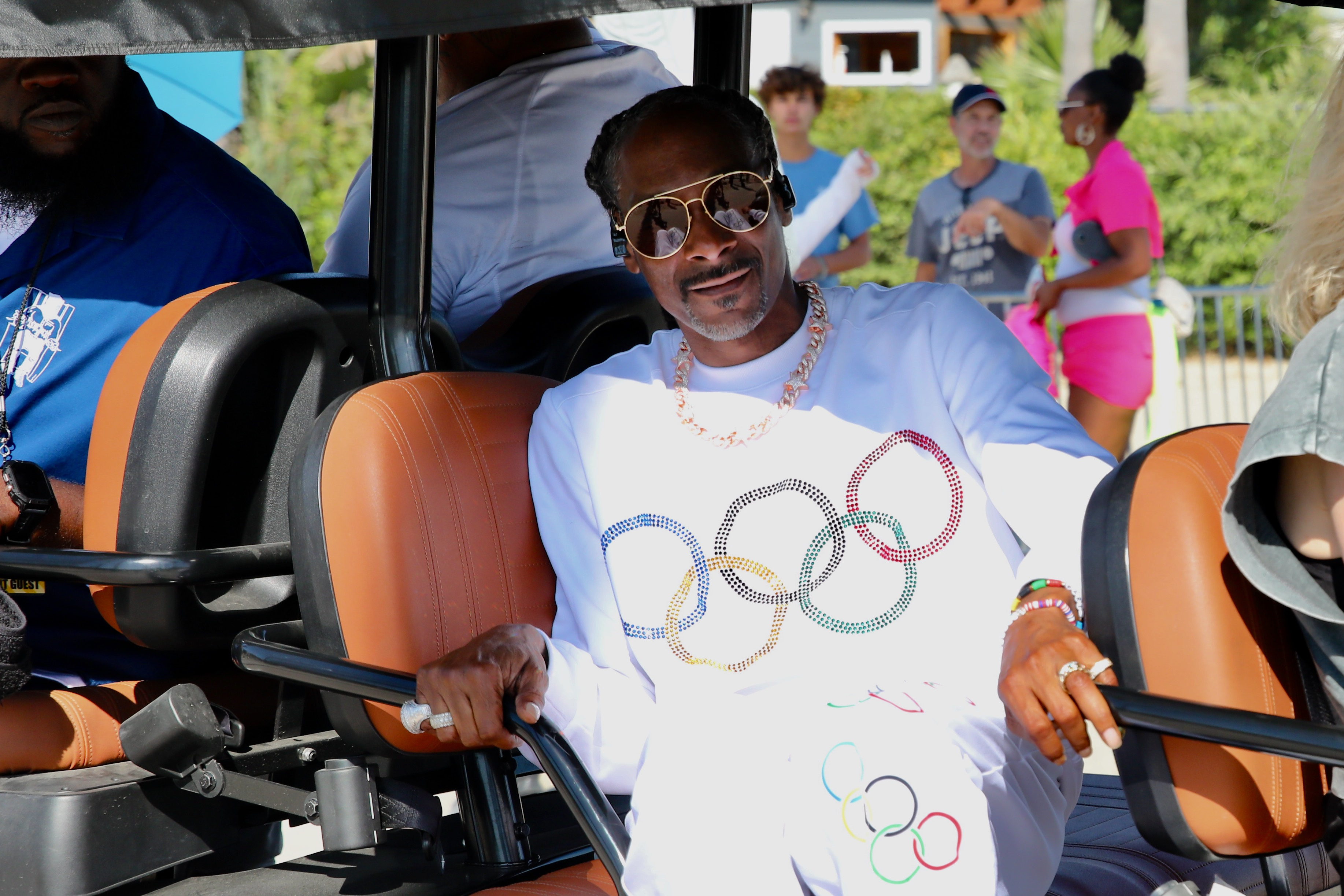 Long Beach native Snoop Dogg is escorted to the stage...