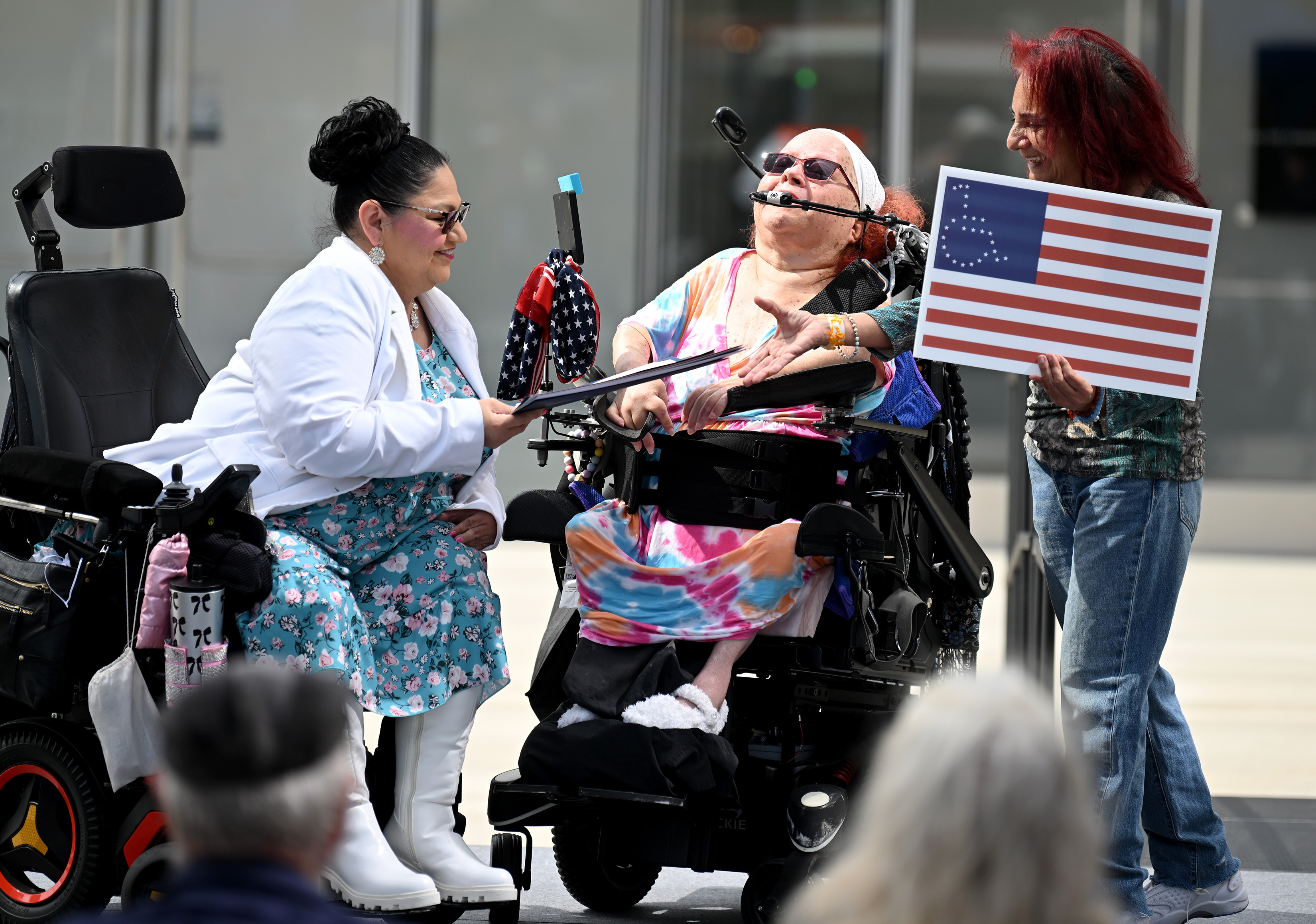 City Councilwoman Mary Zendejas recognizes Cinde Soto, middle, with an...