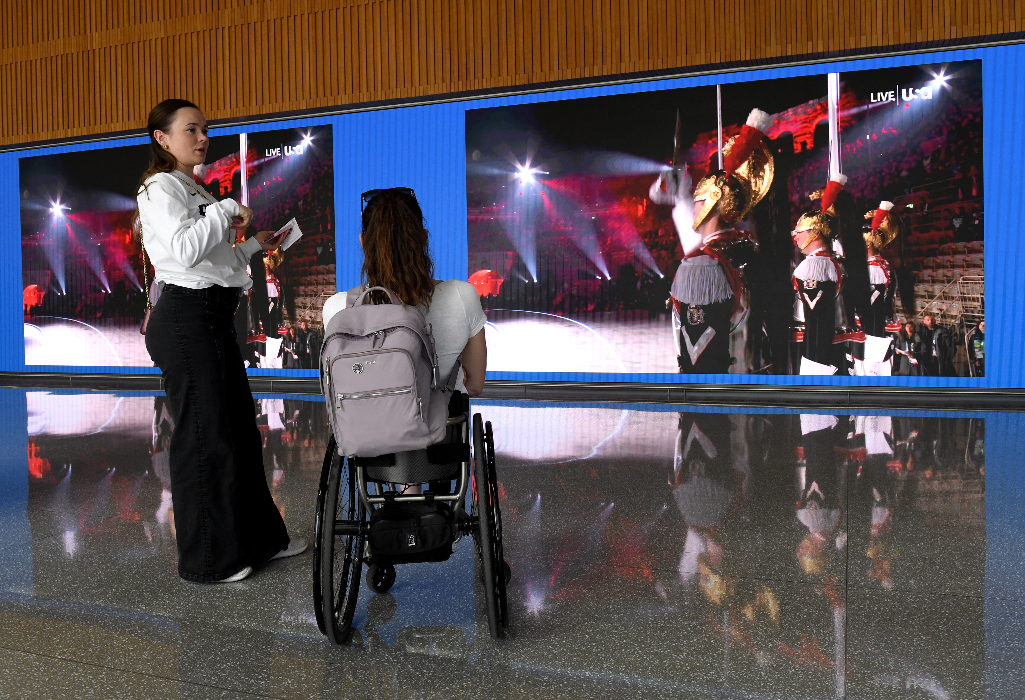 Olympians Mariah Bell, left, and Amanda McGrory attend a community...