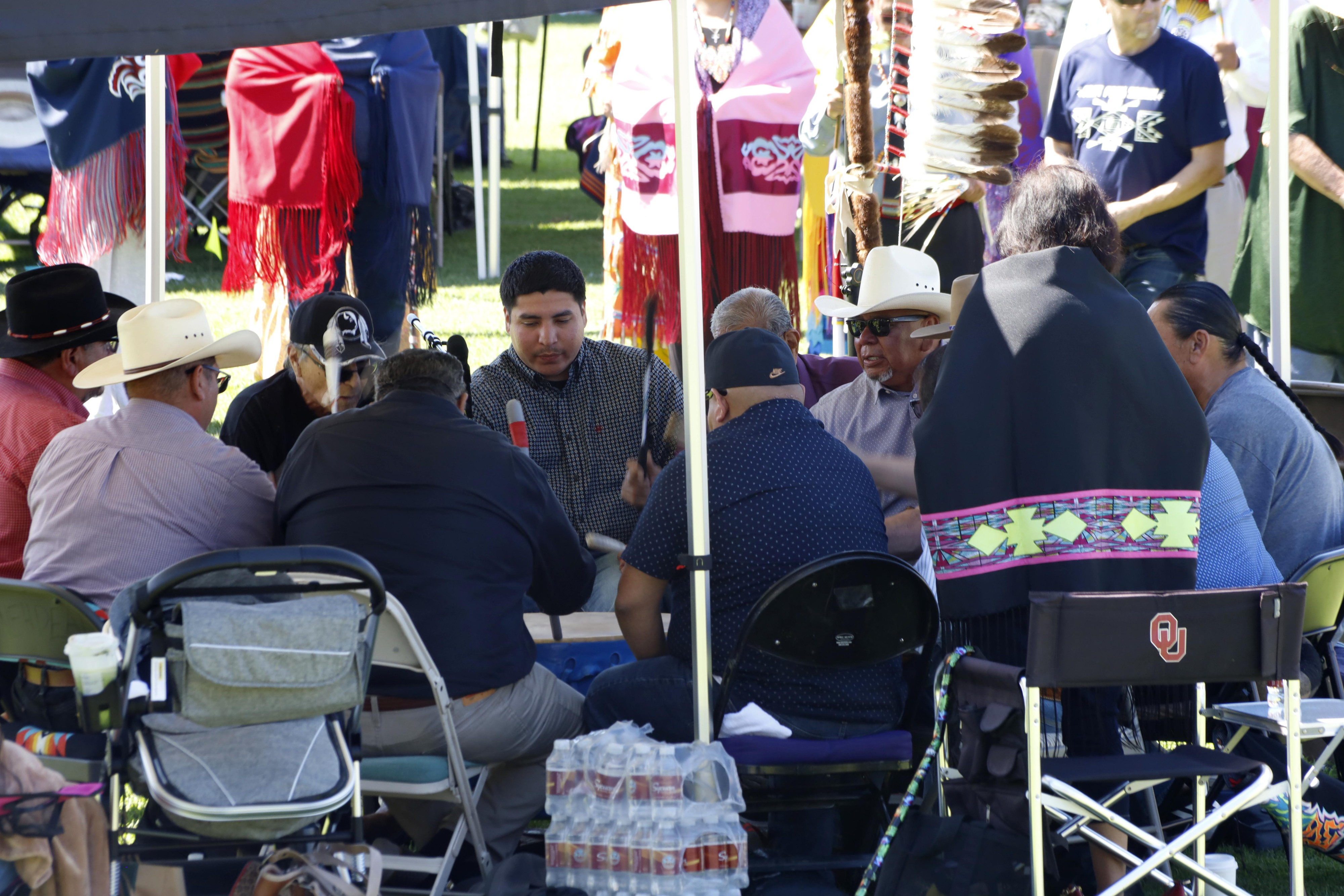 The drum circle sits in the middle of the sacred...