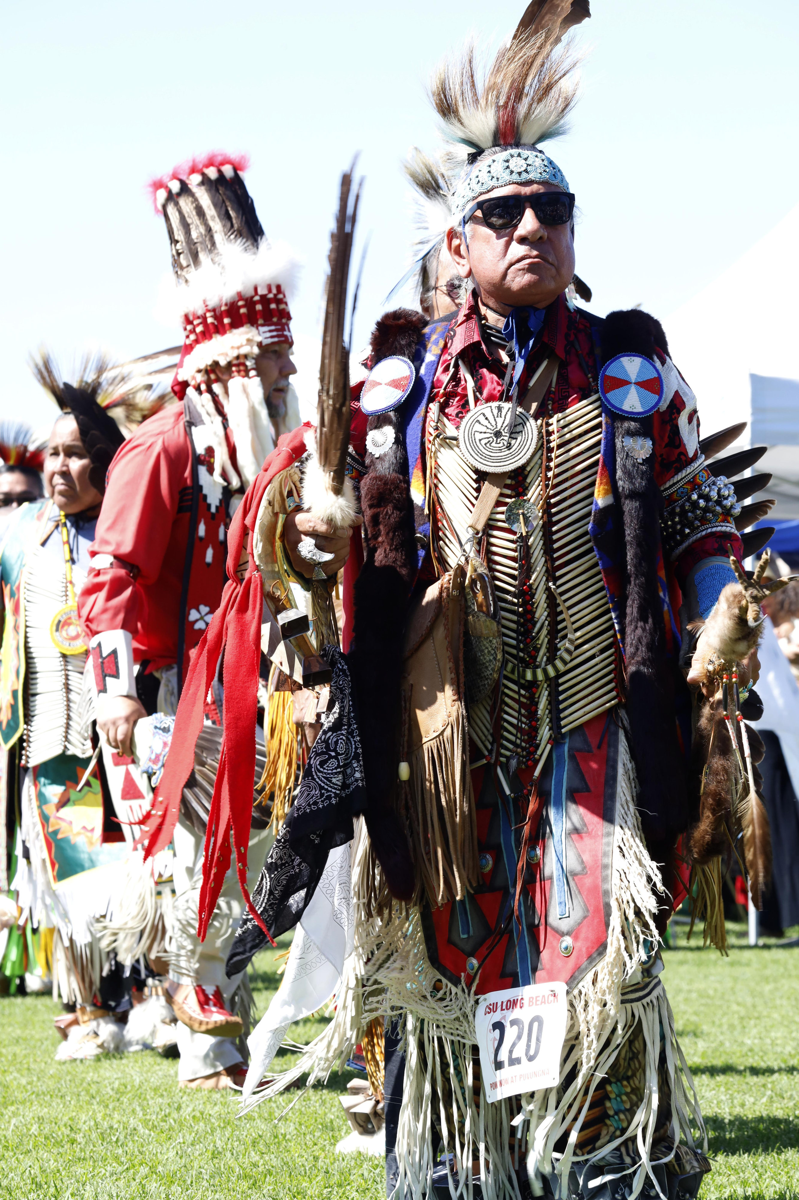 An Elder particpates during the opening dance at the Puvungna...