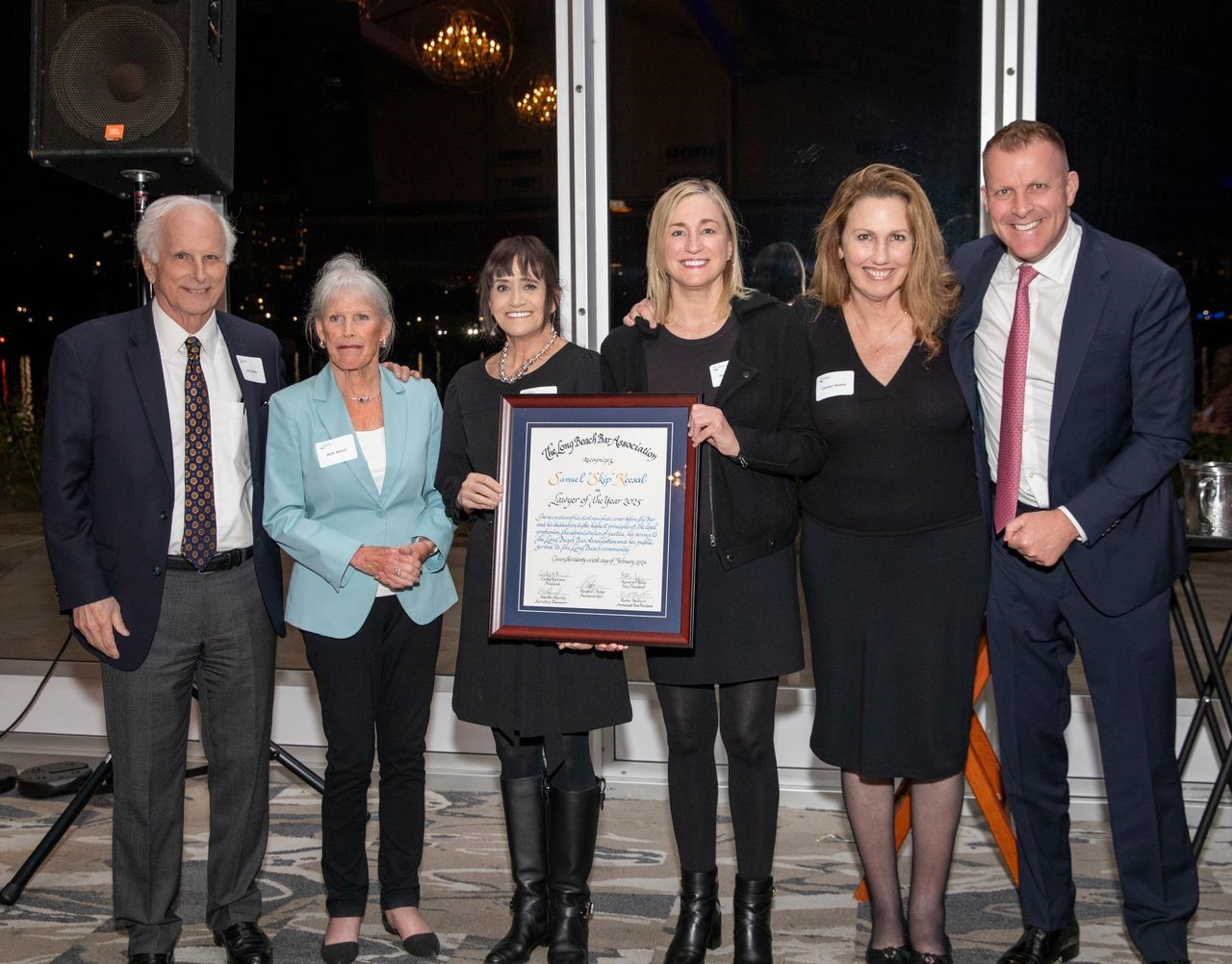 From left, John Giffin with the Keesal family, Beth, Hope,...