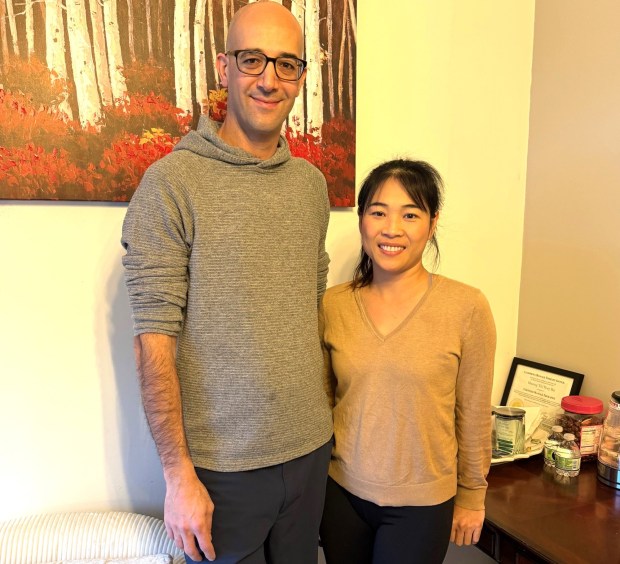 Software developer Edward Ishaq and massage therapist Kate Bui appear recently at Montclair Massage, their new Woodminster Lane business in the Oakland hills. (Ginny Prior for Bay Area News Group)