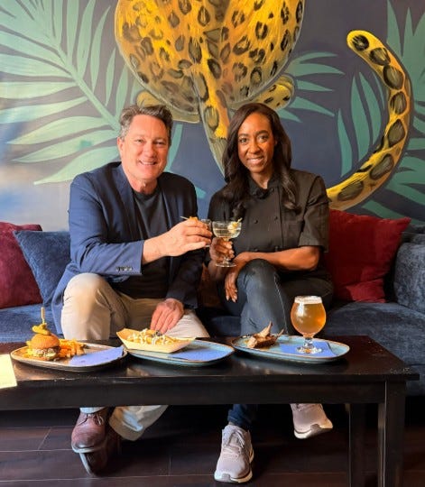 Liam Mayclem with Chef Michele McQueen at Lucy Blue in Oakland.