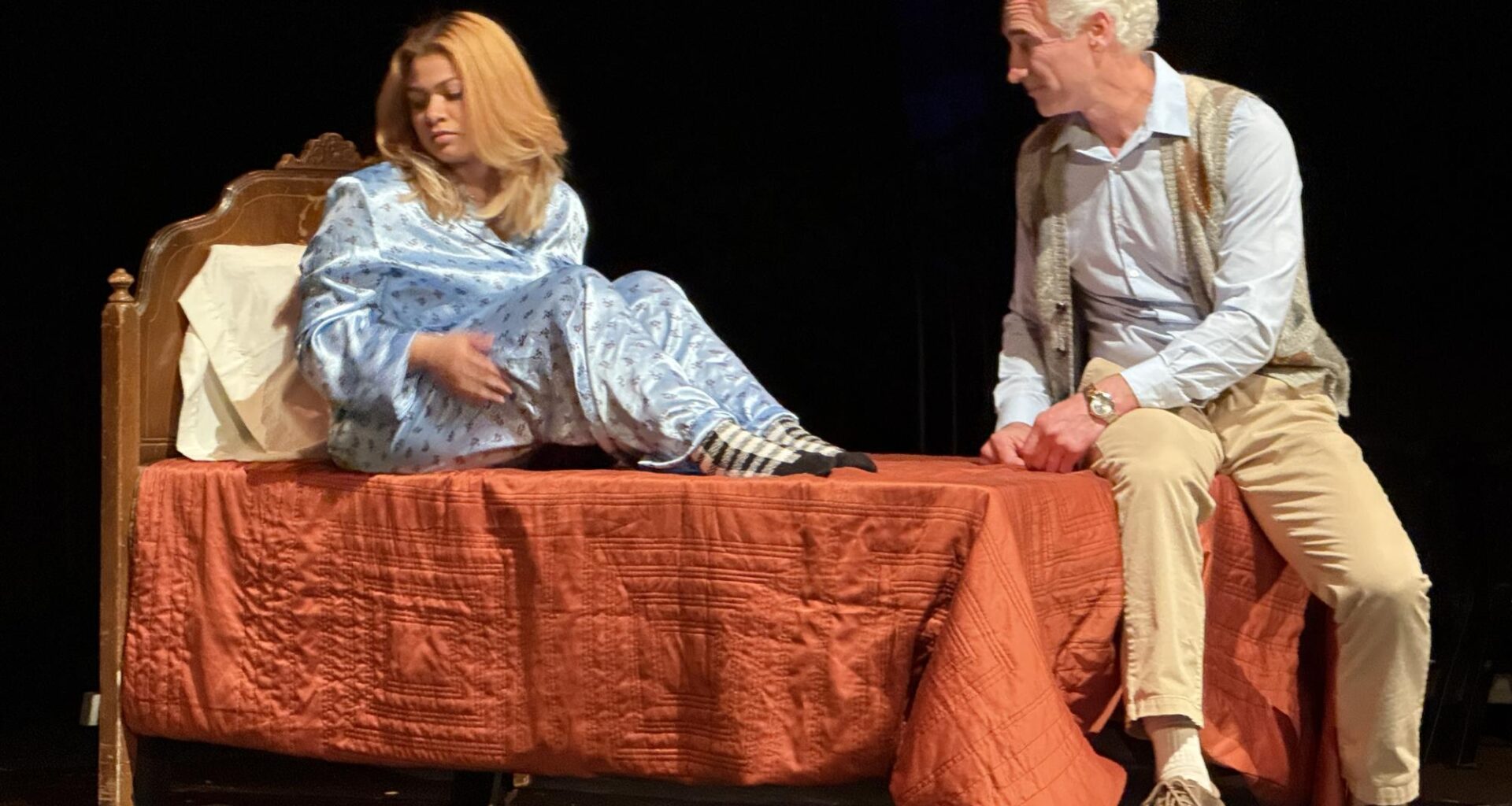 Kate Ortega-Andrade, left, playing Margot, looks away from Danny Sharkey, right, who plays Elwin, as she is consoled on her poor ballet performance during a technical rehearsal of the 10th Annual New Play Festival on Wednesday, March 19,2025. Photo by Luke Bradbury/City Times Media