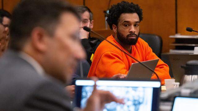 Murder suspect Mtula Payton, center, listen to prosecutor Brad Ng, left, question a cousin of victim Sergio Harris during a preliminary hearing in Sacramento Superior Court on Tuesday, April 4, 2024, in the case of the April 2022 mass shooting in downtown Sacramento.