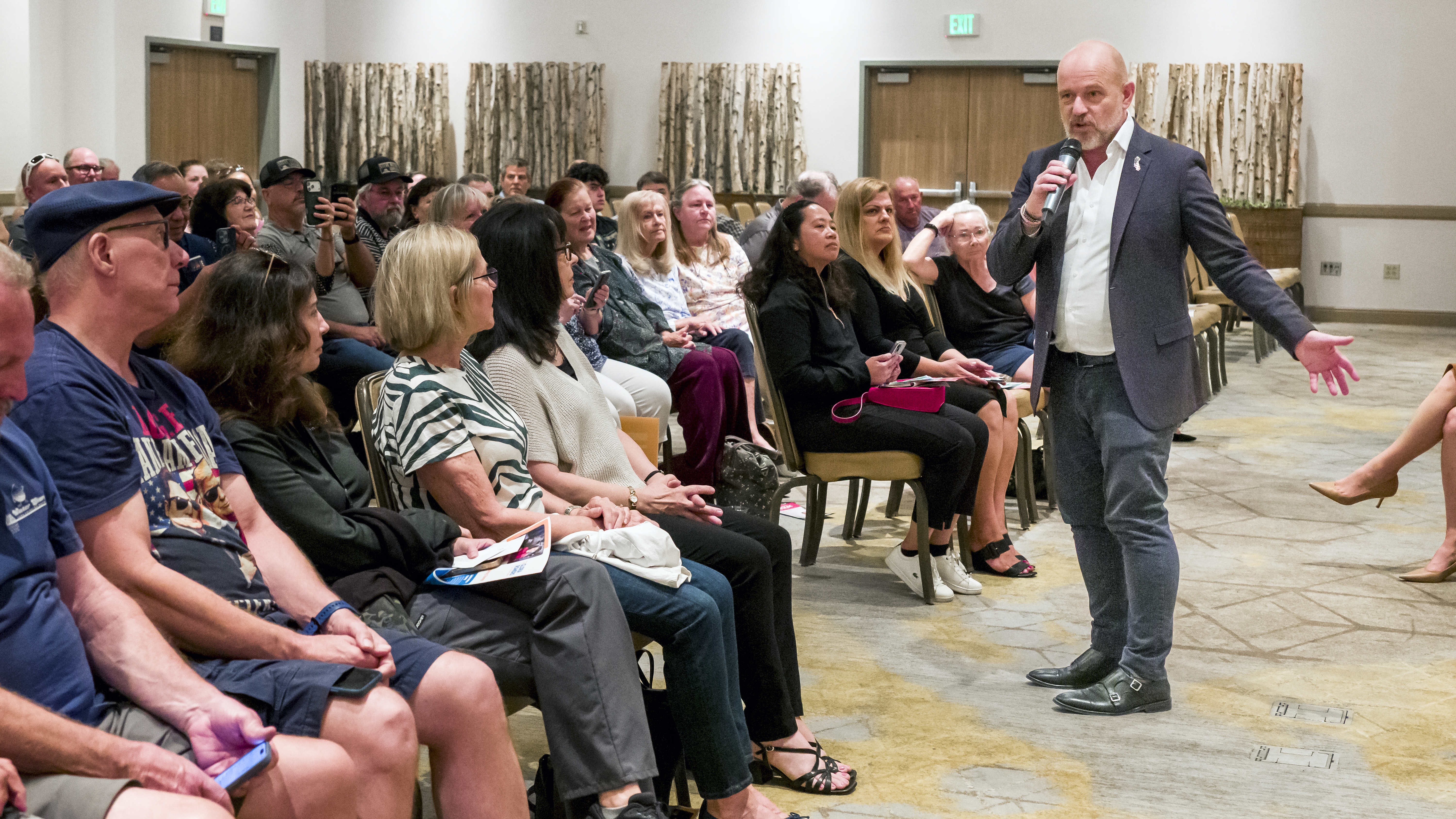 California gubernatorial candidate Steve Hilton, right, speaks during an affordability...