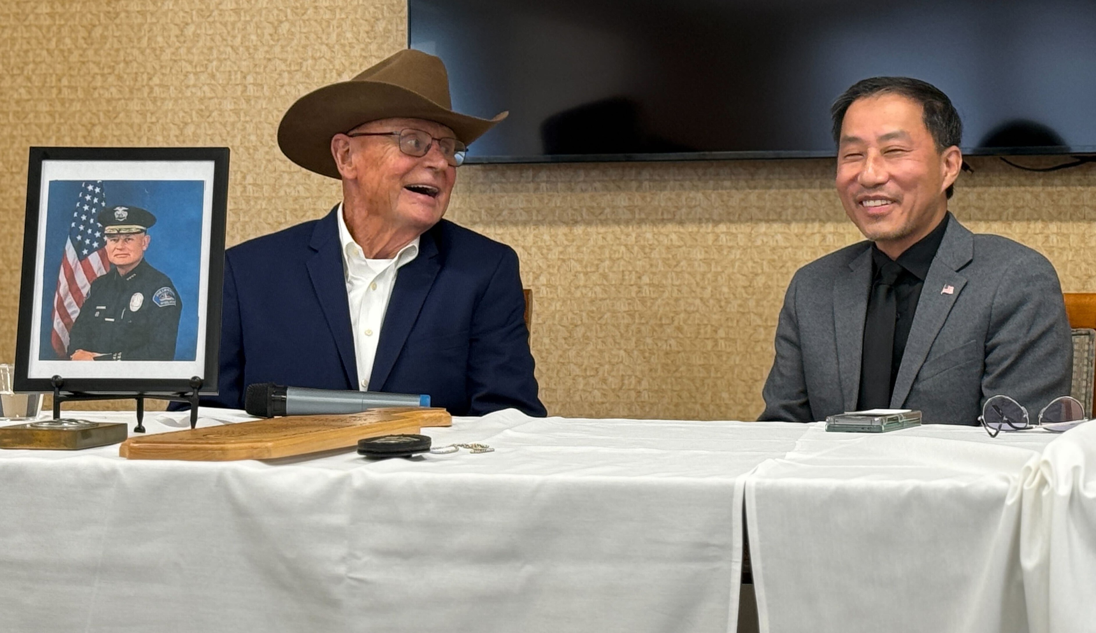 Retired Fullerton Police Chief Pat McKinley, left, was honored by...