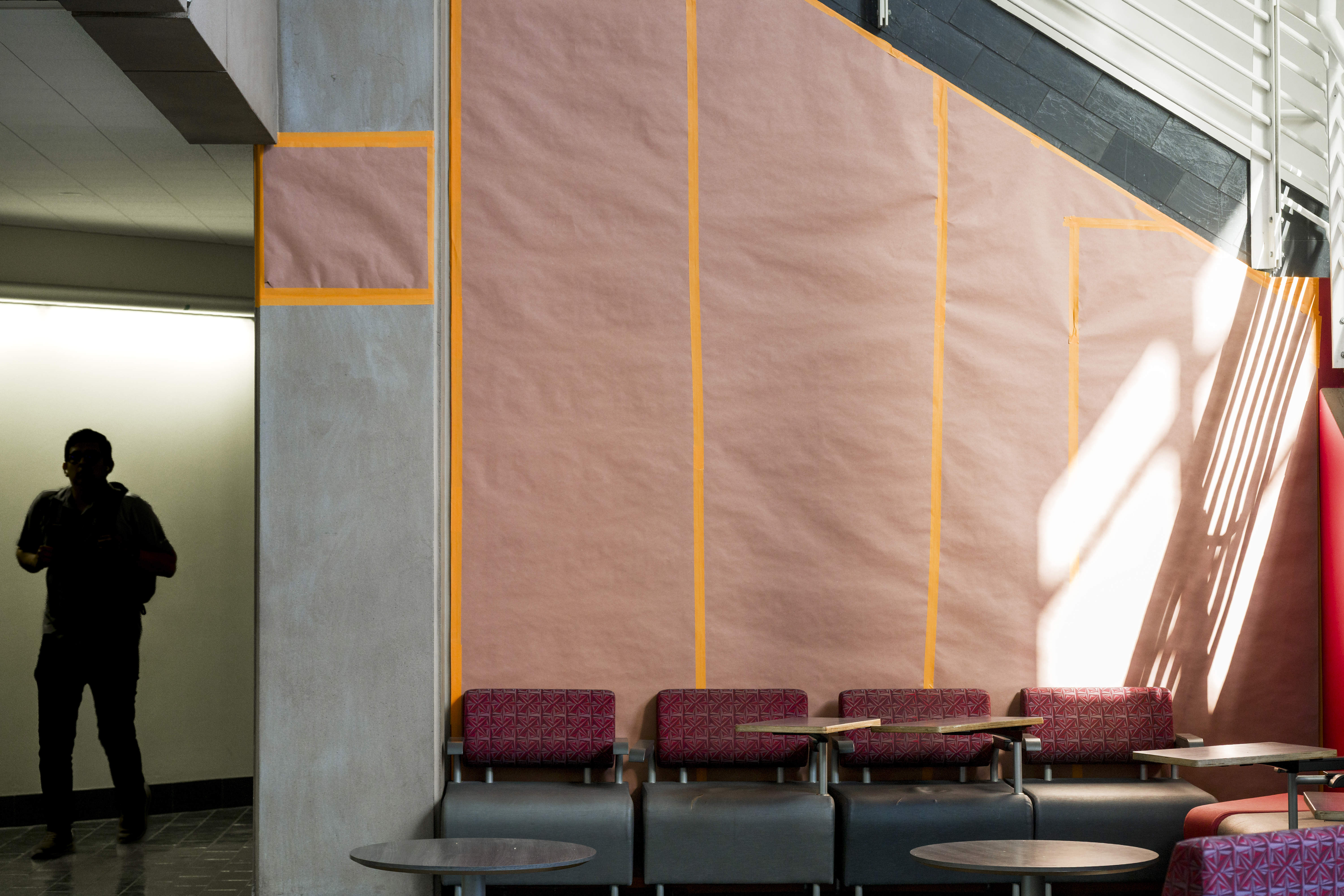 Santa Ana College used paper to cover up the mural...