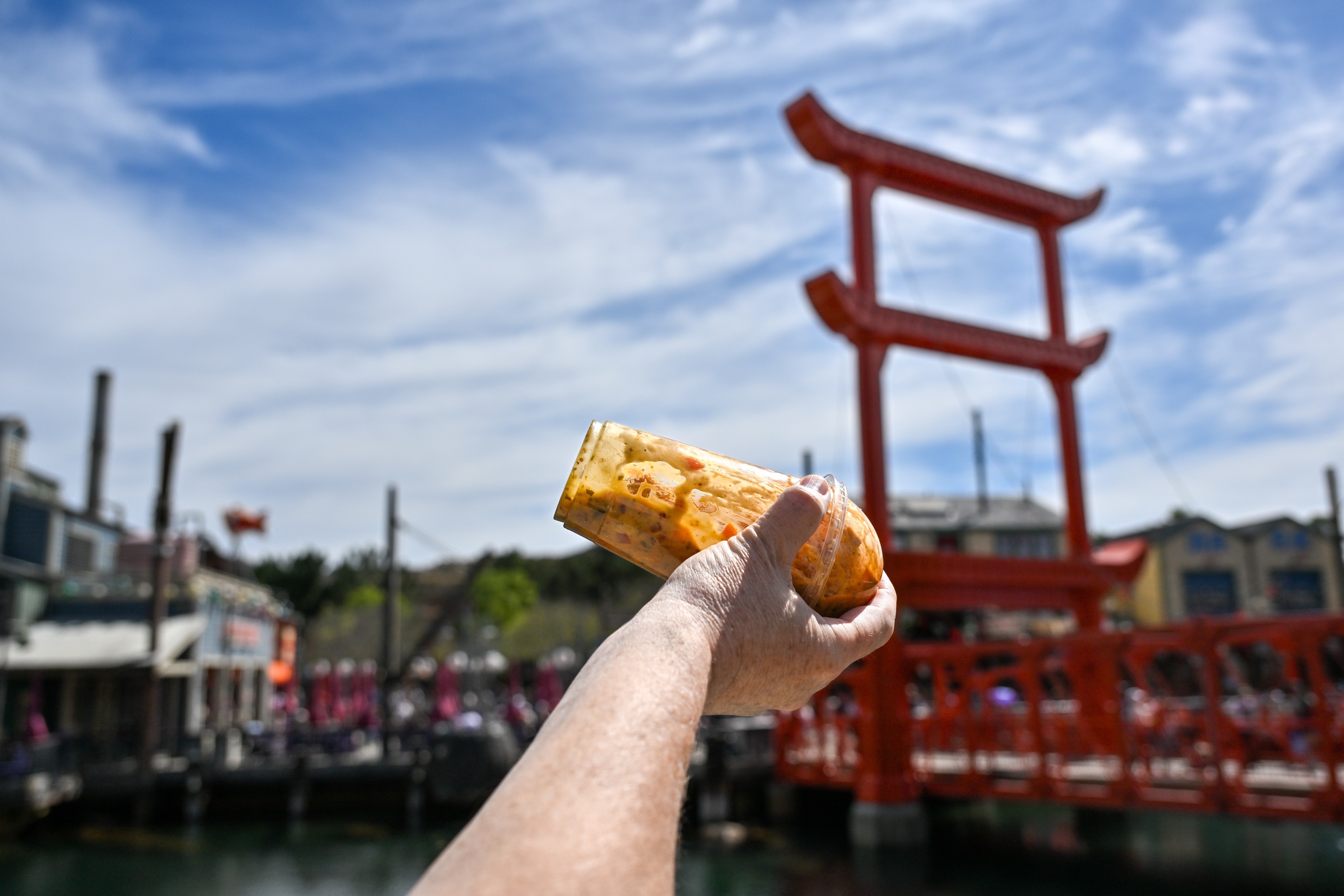 Brady MacDonald shakes his ChicharrÃ³n Nachos to mix them up...
